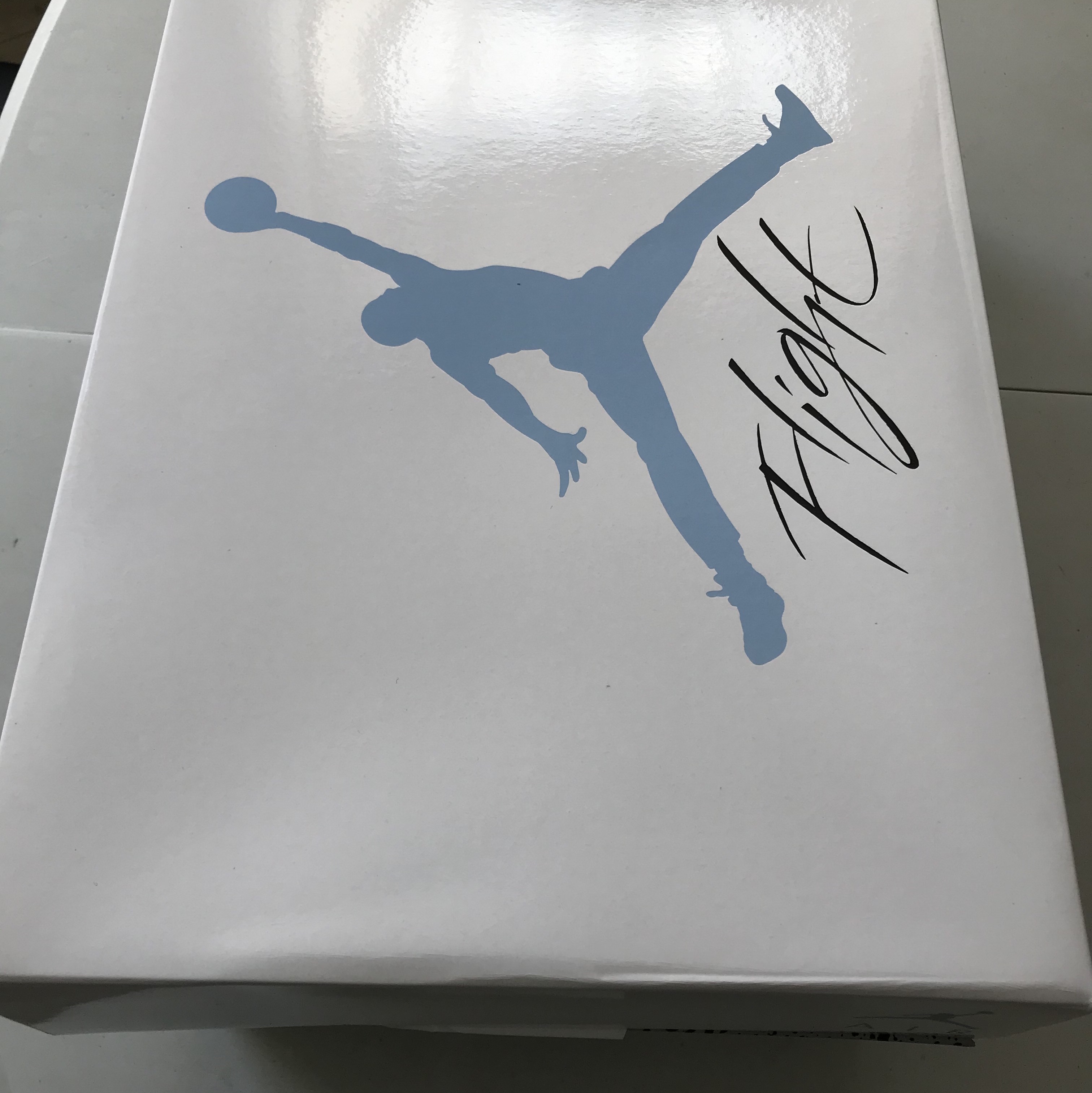 Jordan 4 Retro University Blue 착용 스타일 - 1