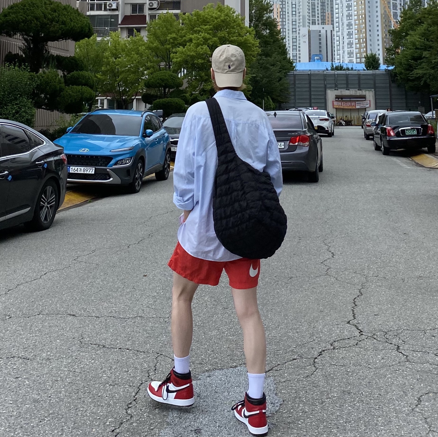 Nike x Stussy Water Shorts Habanero Red 착용 스타일