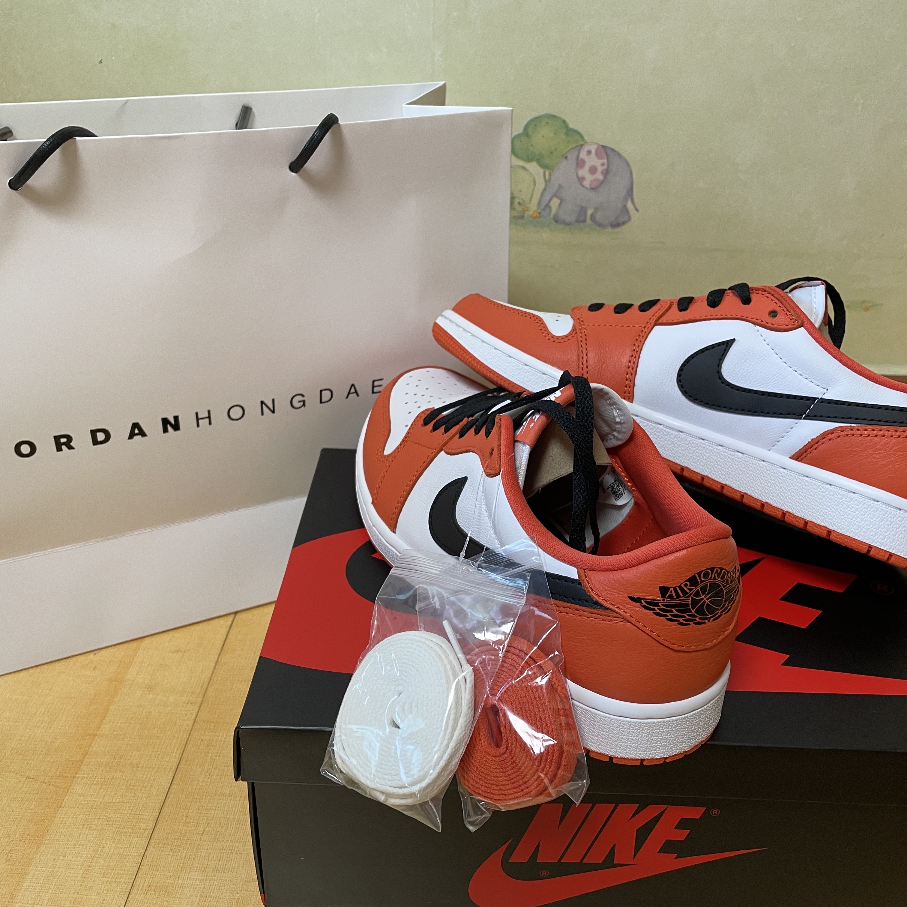 Jordan 1 Low OG Starfish 착용 스타일 - 1