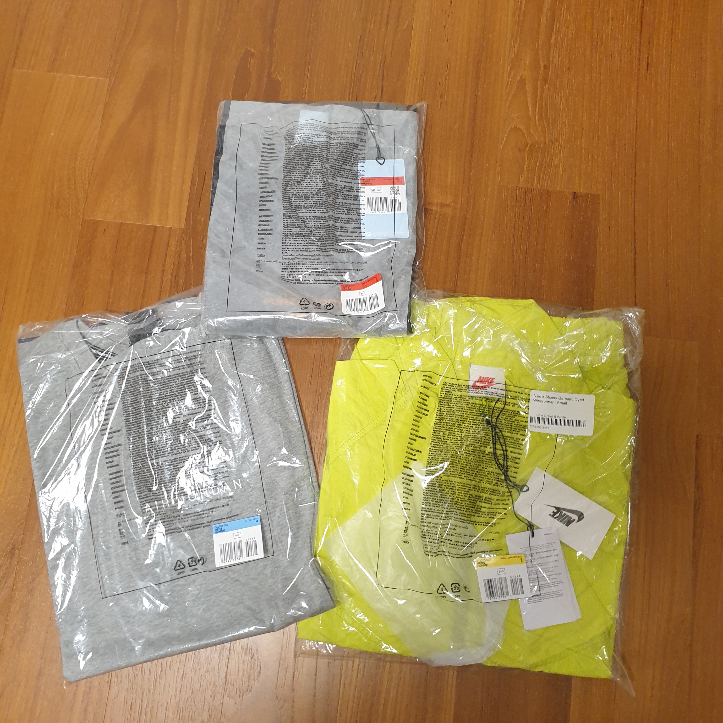 Nike x Stussy Windrunner Jacket Bright Cactus, Nike x Drake Nocta Essential T-Shirt Black - US/EU 착용 스타일