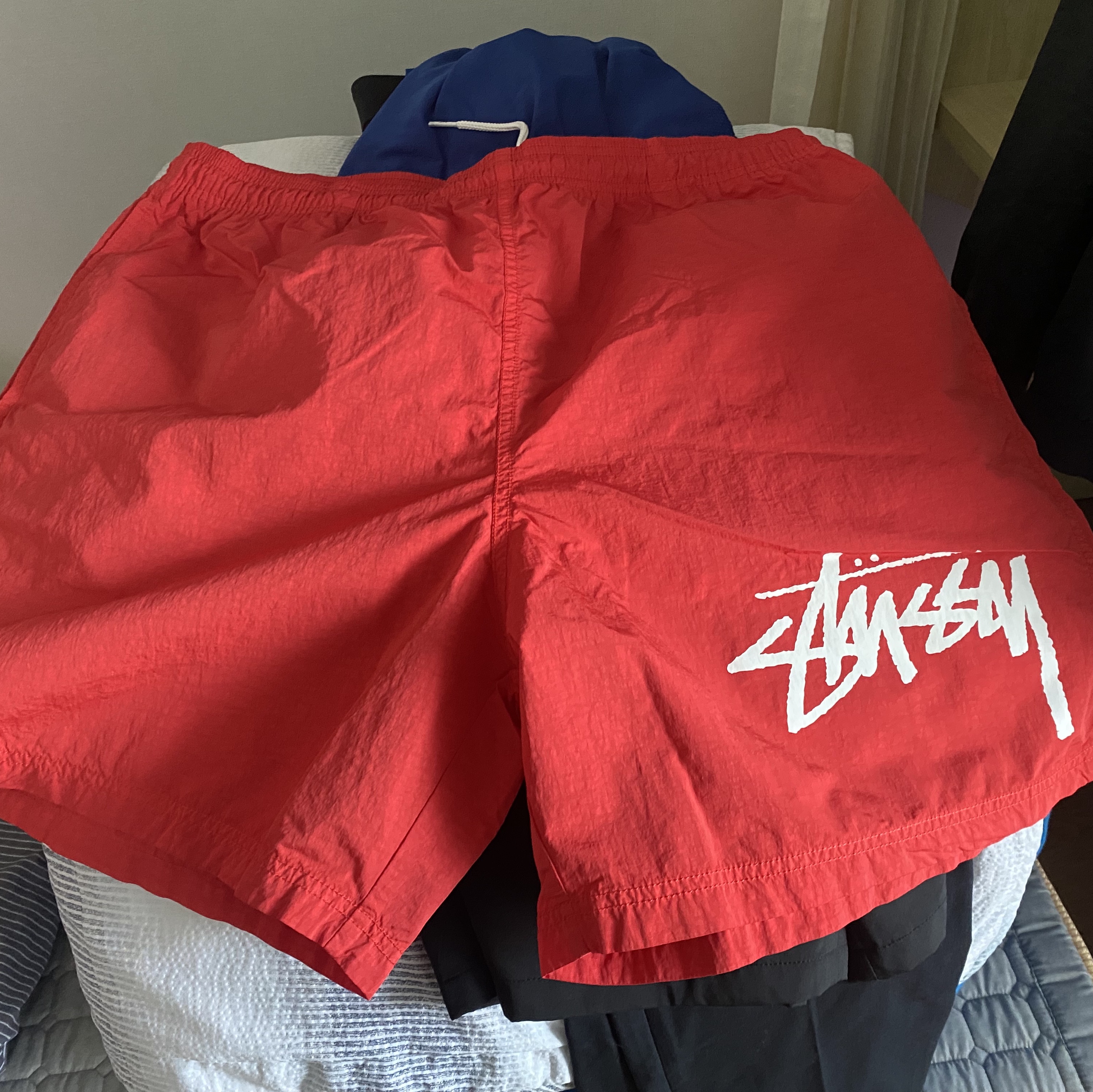 Nike x Stussy Water Shorts Habanero Red 착용 스타일