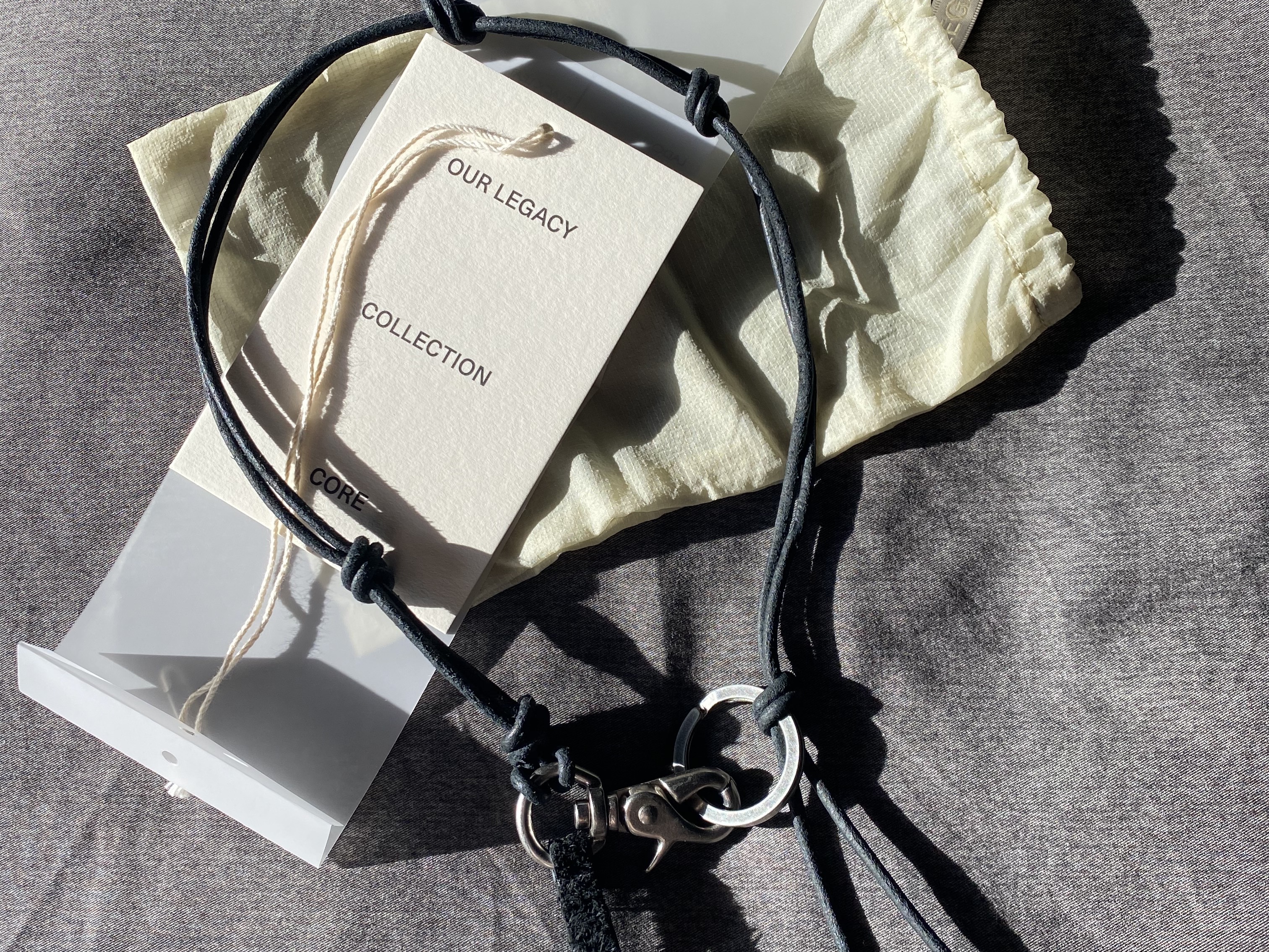 Our Legacy Ladon Leather Keychain Black 착용 스타일
