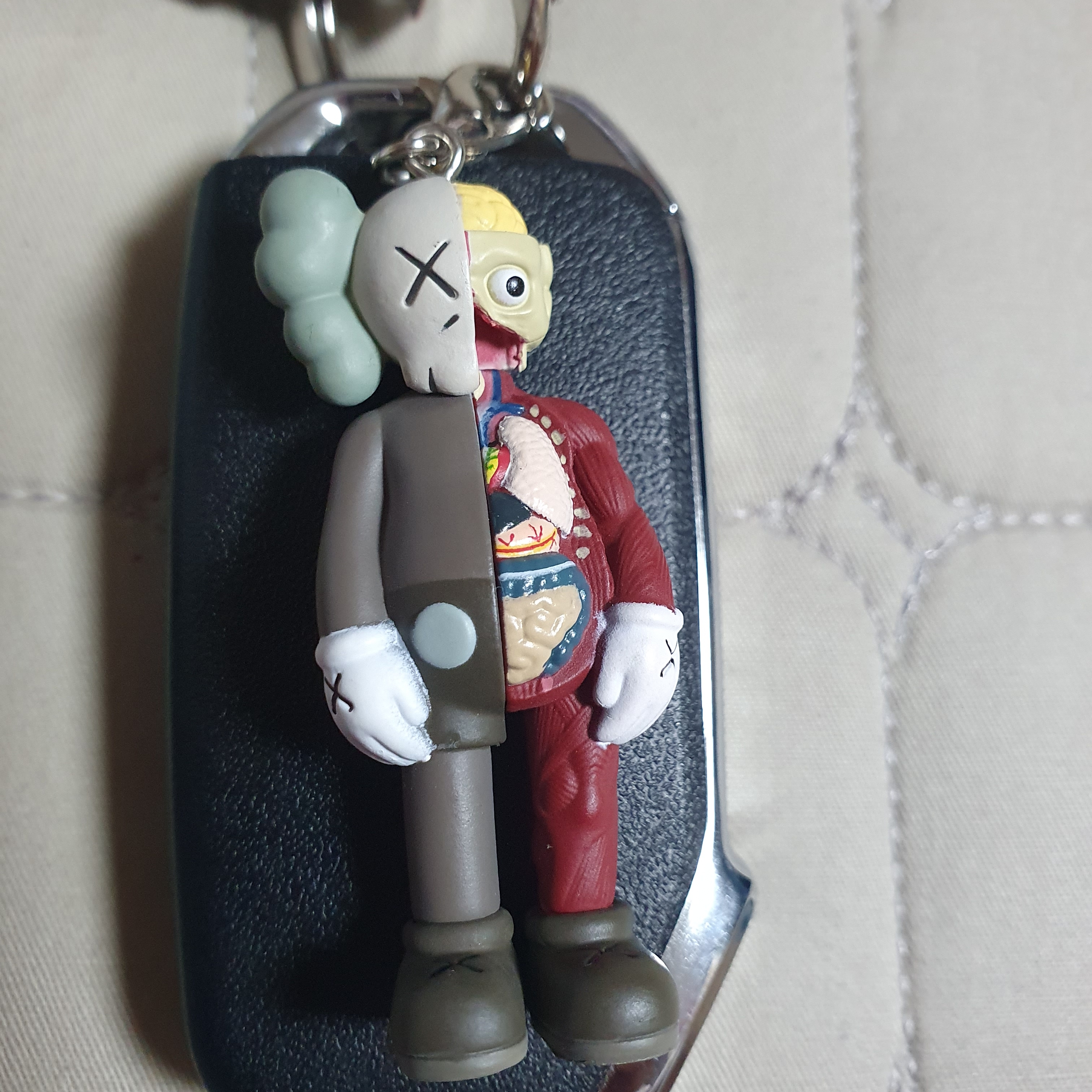 Kaws Tokyo First Companion Flayed Keychain Brown 착용 스타일
