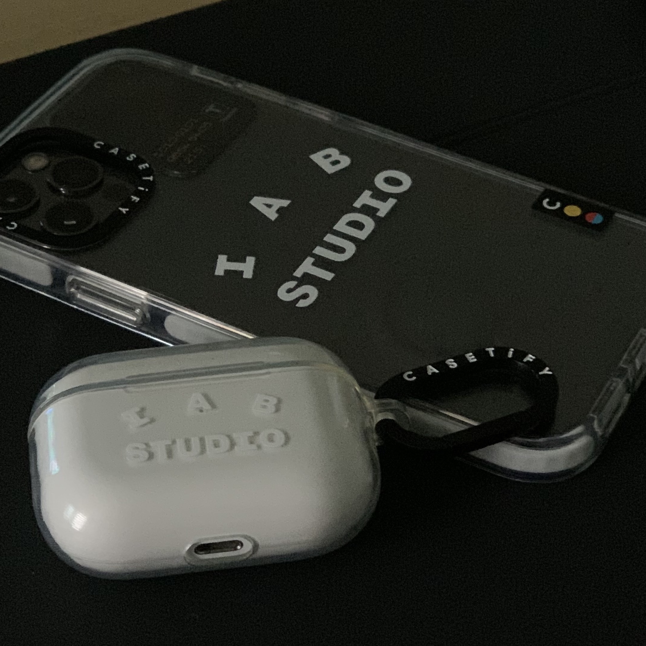 Casetify x IAB Studio Single White Logo AirPods Pro Case Clear, Casetify x IAB Studio iPhone White Logo Impact Case Frost White 착용 스타일