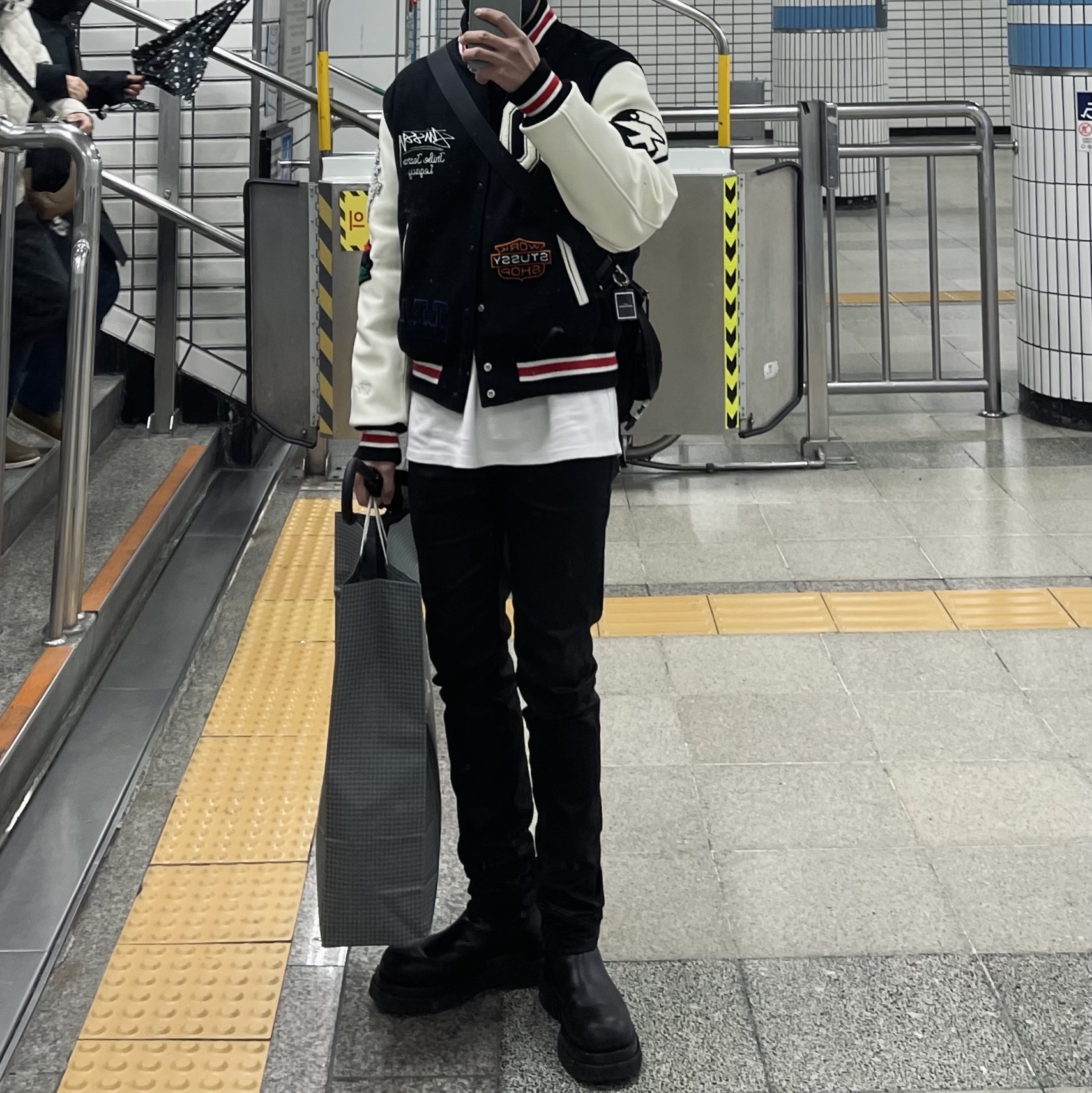 Stussy x Our Legacy x Denim Tears TTL Varsity Jacket Black, Prada Re-Nylon and Saffiano Leather Shoulder Bag Black 착용 스타일