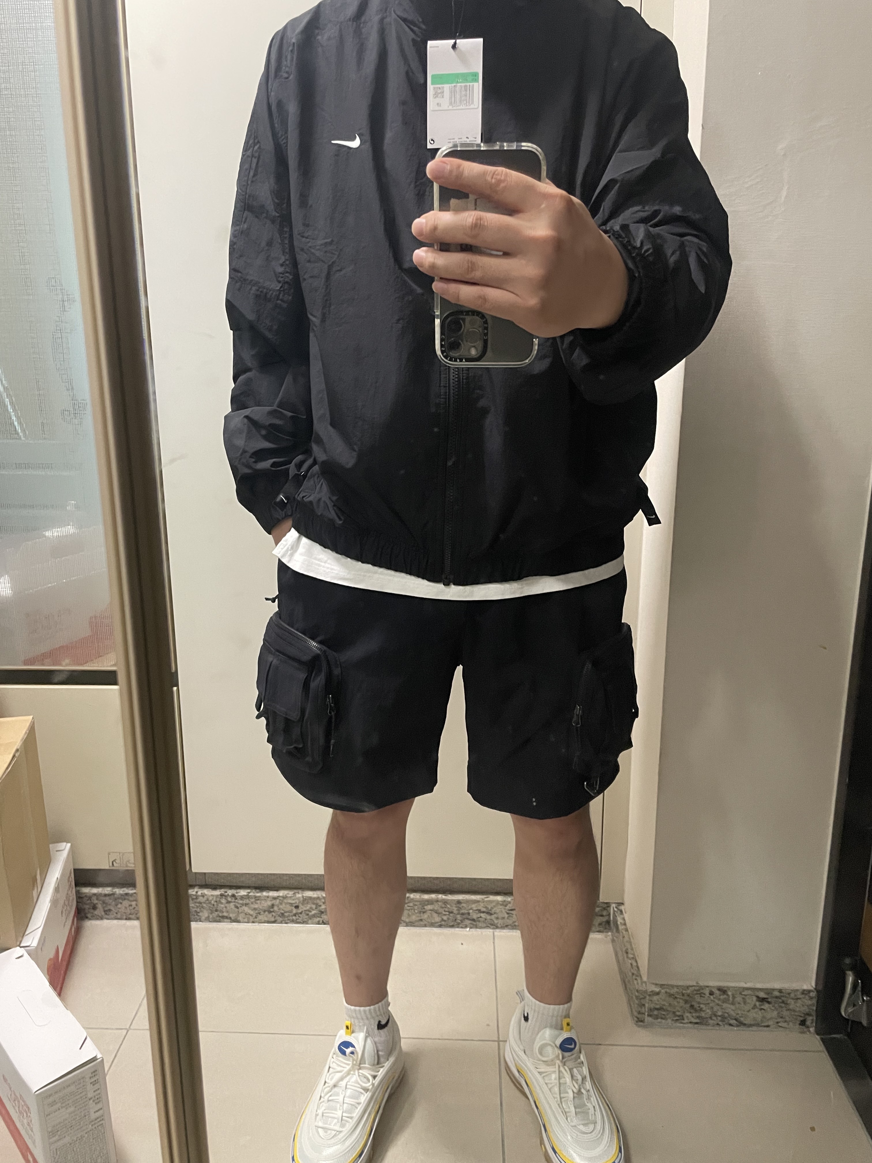 Nike NRG Solo Swoosh Woven Track Jacket Black - Asia, Nike ACG Cargo Shorts Black - Asia 착용 스타일 - 1