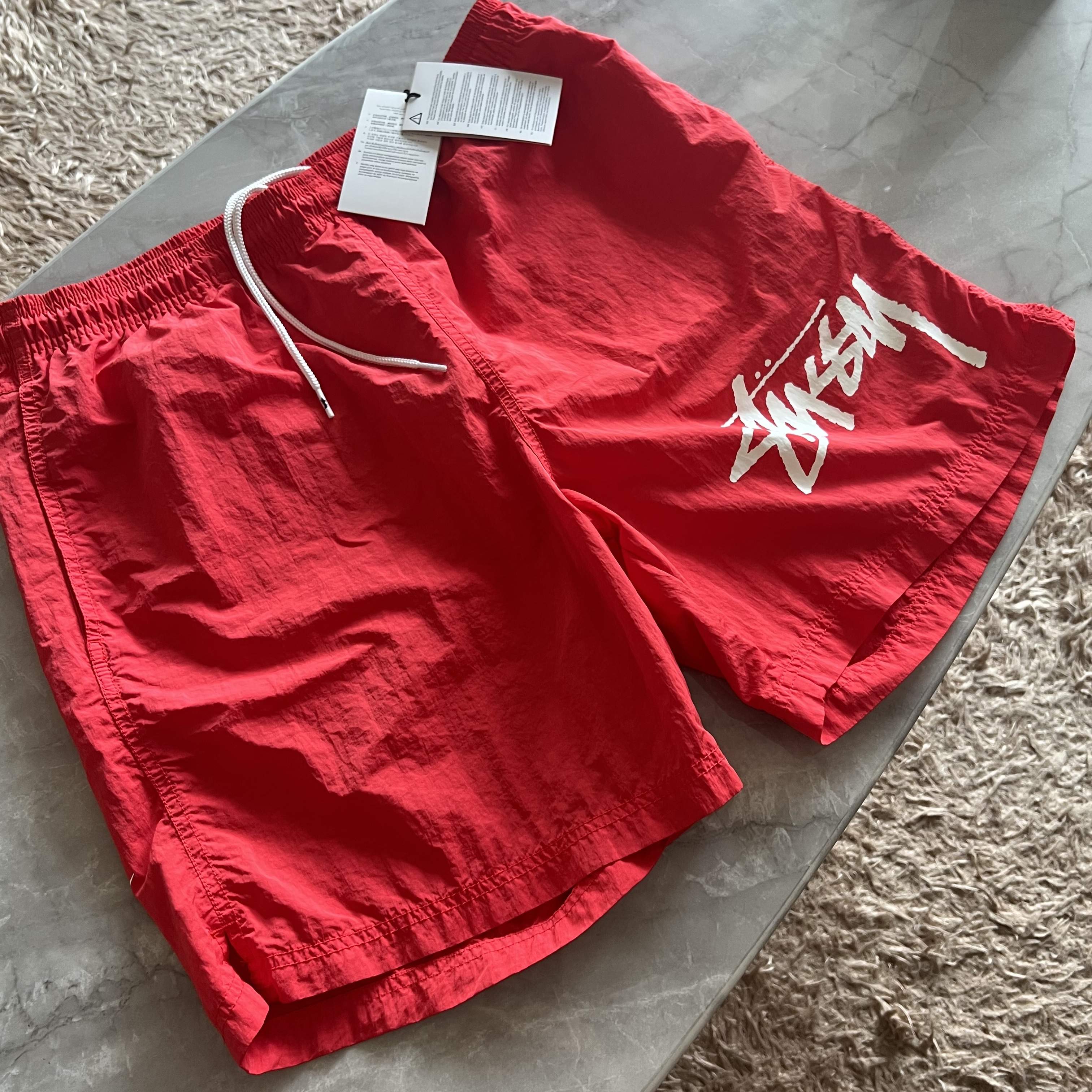 Nike x Stussy Water Shorts Habanero Red 착용 스타일