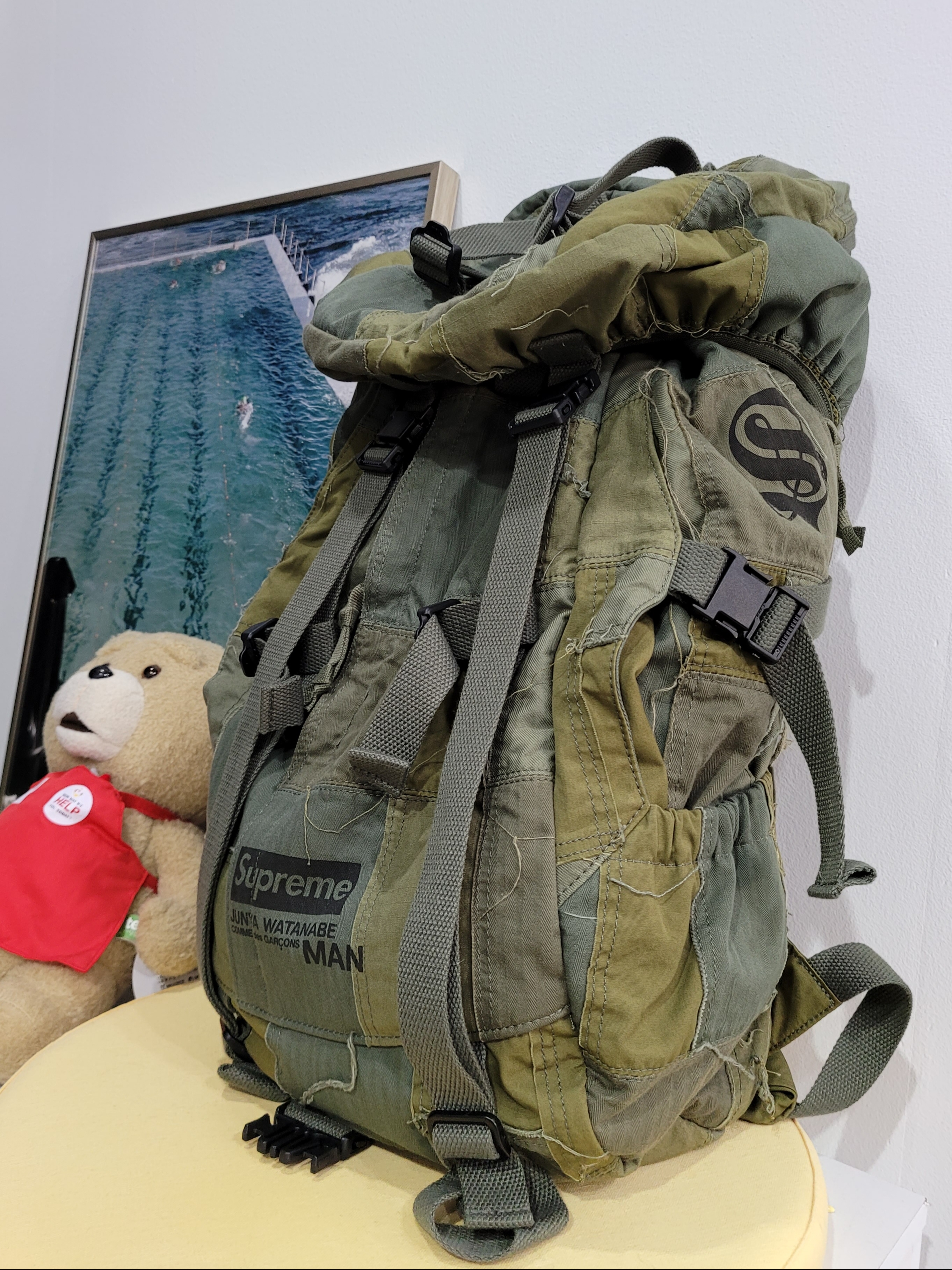 Supreme x Comme des Garcons Junya Watanabe Man Patchwork Backpack Olive - 21FW, Essentials The Core Collection Short Sleeve Polo Black 착용 스타일 - 3