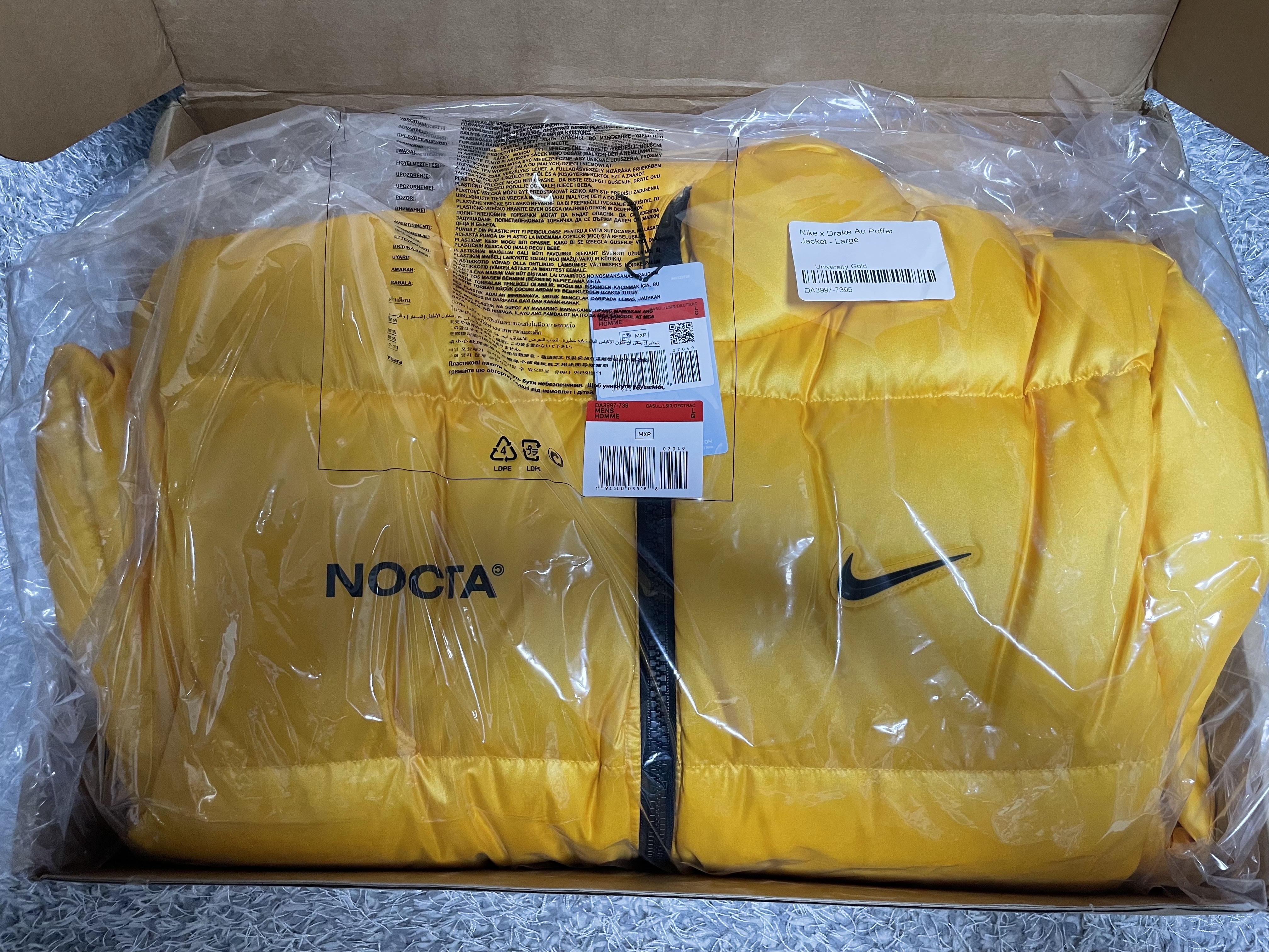 Nike x Drake Nocta Puffer Jacket University Gold - US/EU 착용 스타일