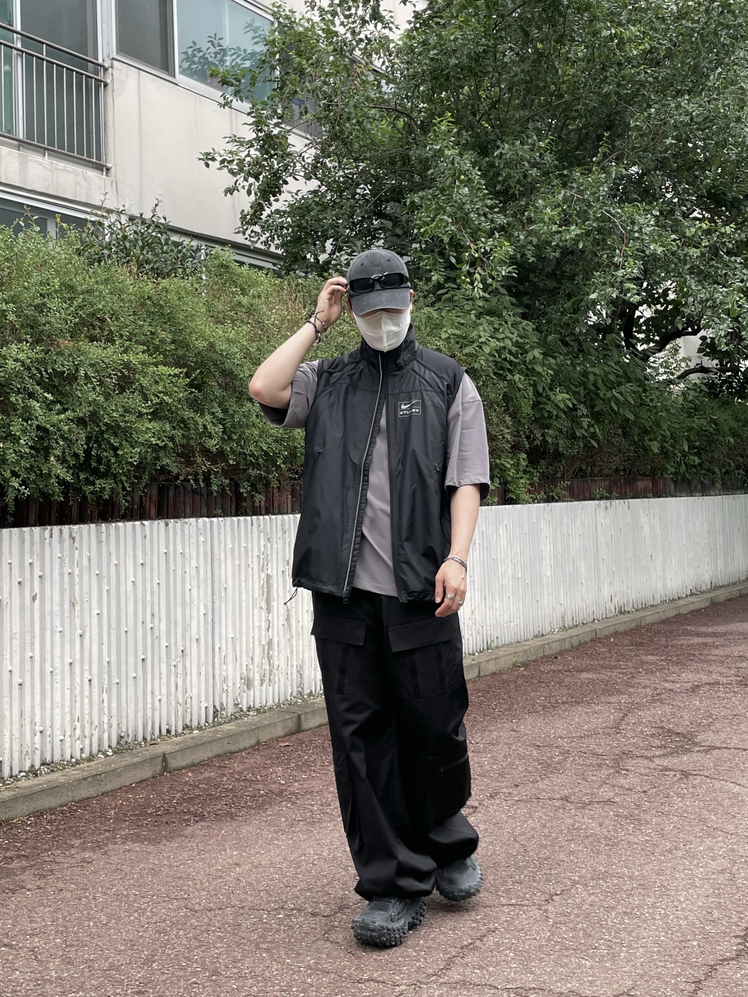 Nike x Stussy NRG FL Storm-Fit Jacket Black (DO5304-010), Balenciaga Defender Sneakers Black 착용 스타일 - 3