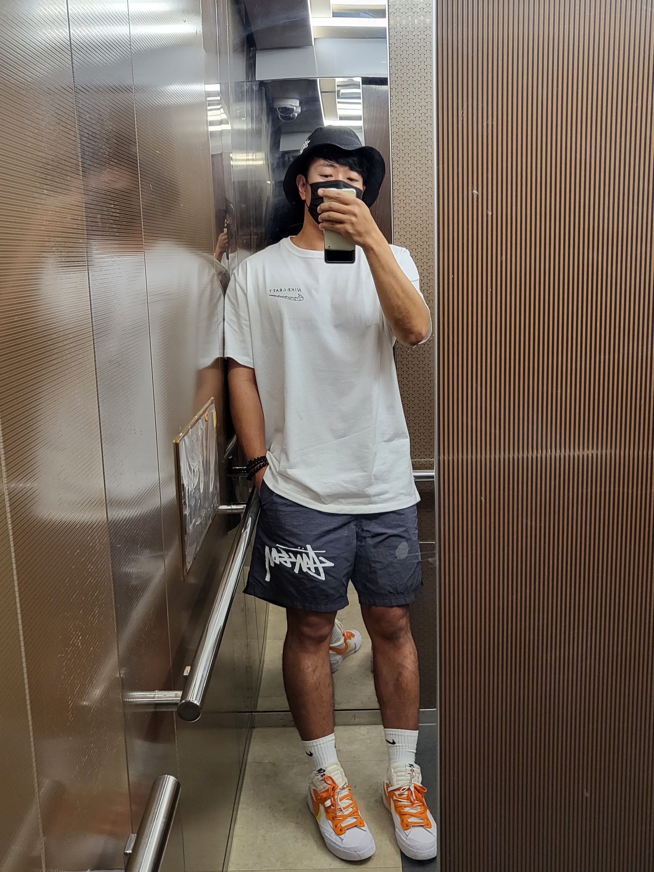 Nike x Stussy Water Shorts Off Noir, Nike x Stussy Bucket Hat Black 착용 스타일
