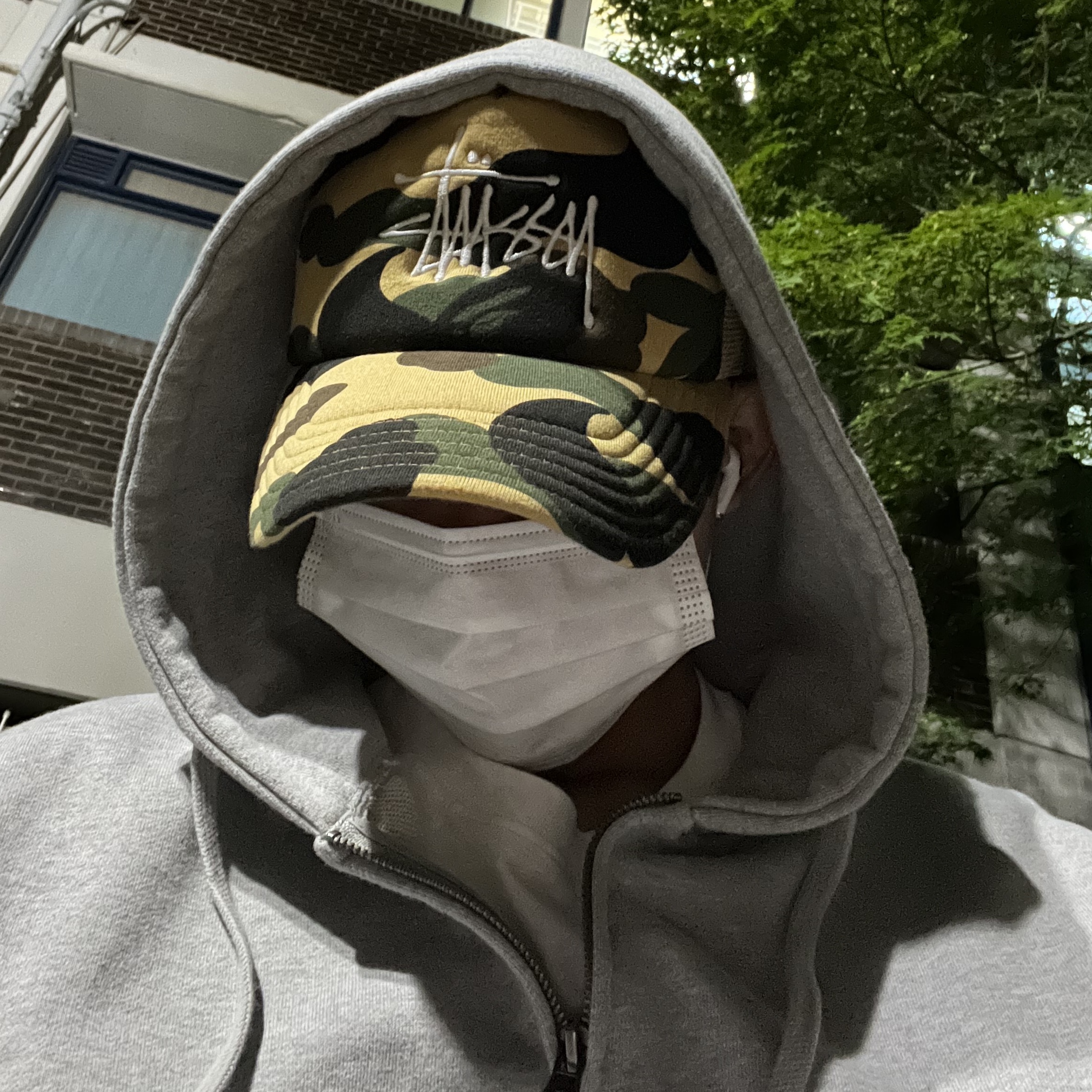 Stussy x BAPE Trucker Cap Yellow 착용 스타일