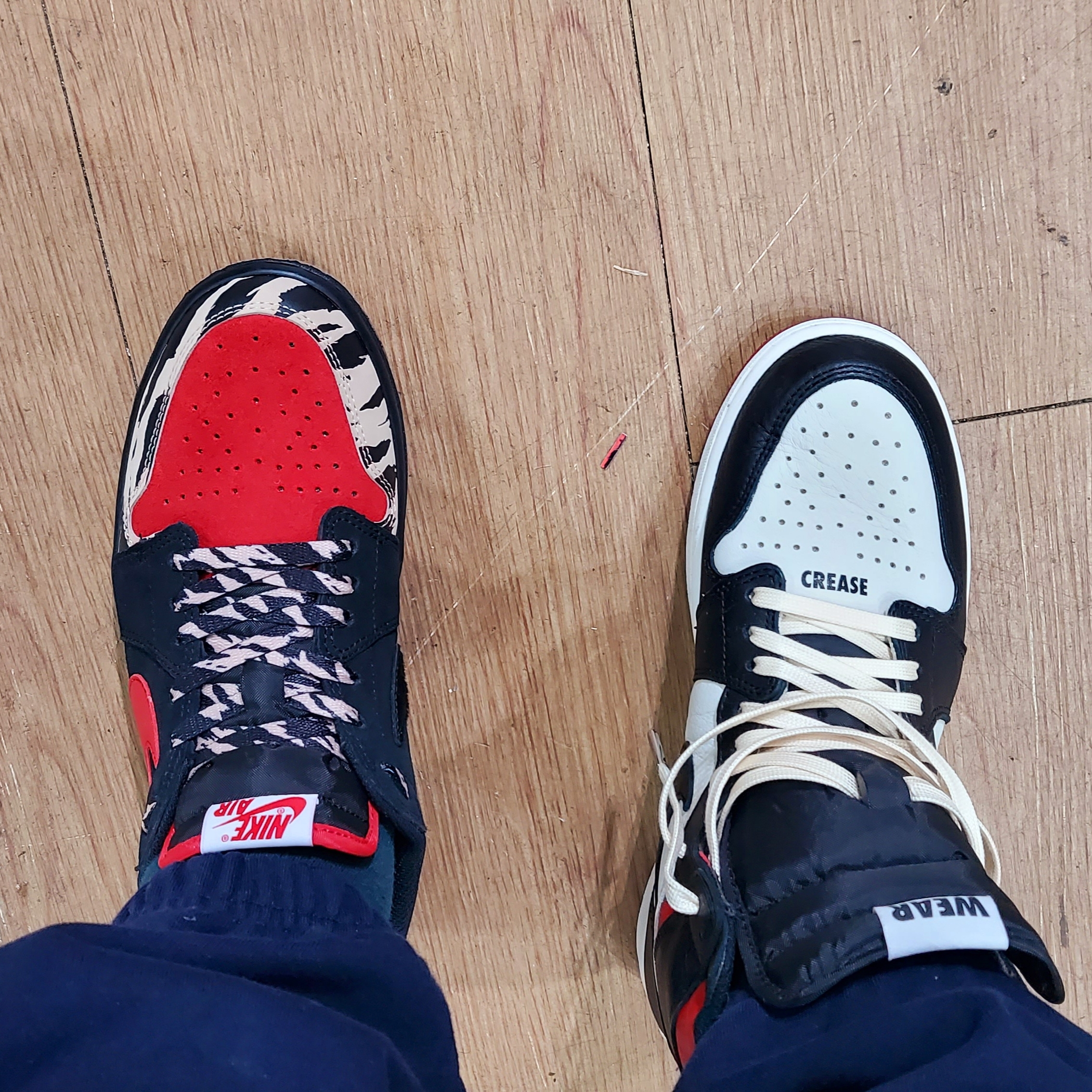 Jordan 1 x SoleFly Retro Low OG SP Black and Sport Red 착용 스타일 - 1