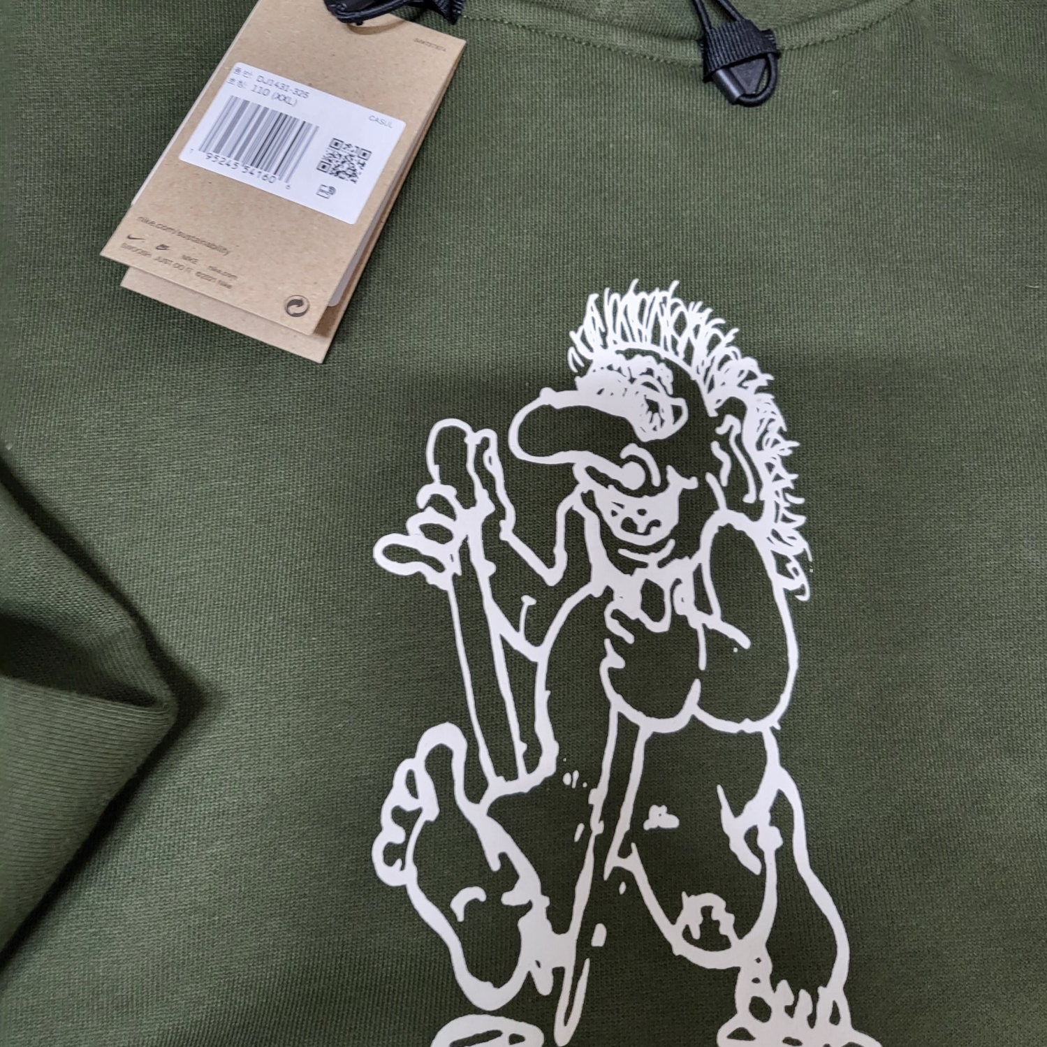 Nike ACG Therma-Fit Fleece Hoodie Troll Graphic Cargo Khaki - Asia, Nike ACG Therma-Fit Fleece Hoodie Troll Graphic Cargo Khaki - US/EU 착용 스타일 - 1
