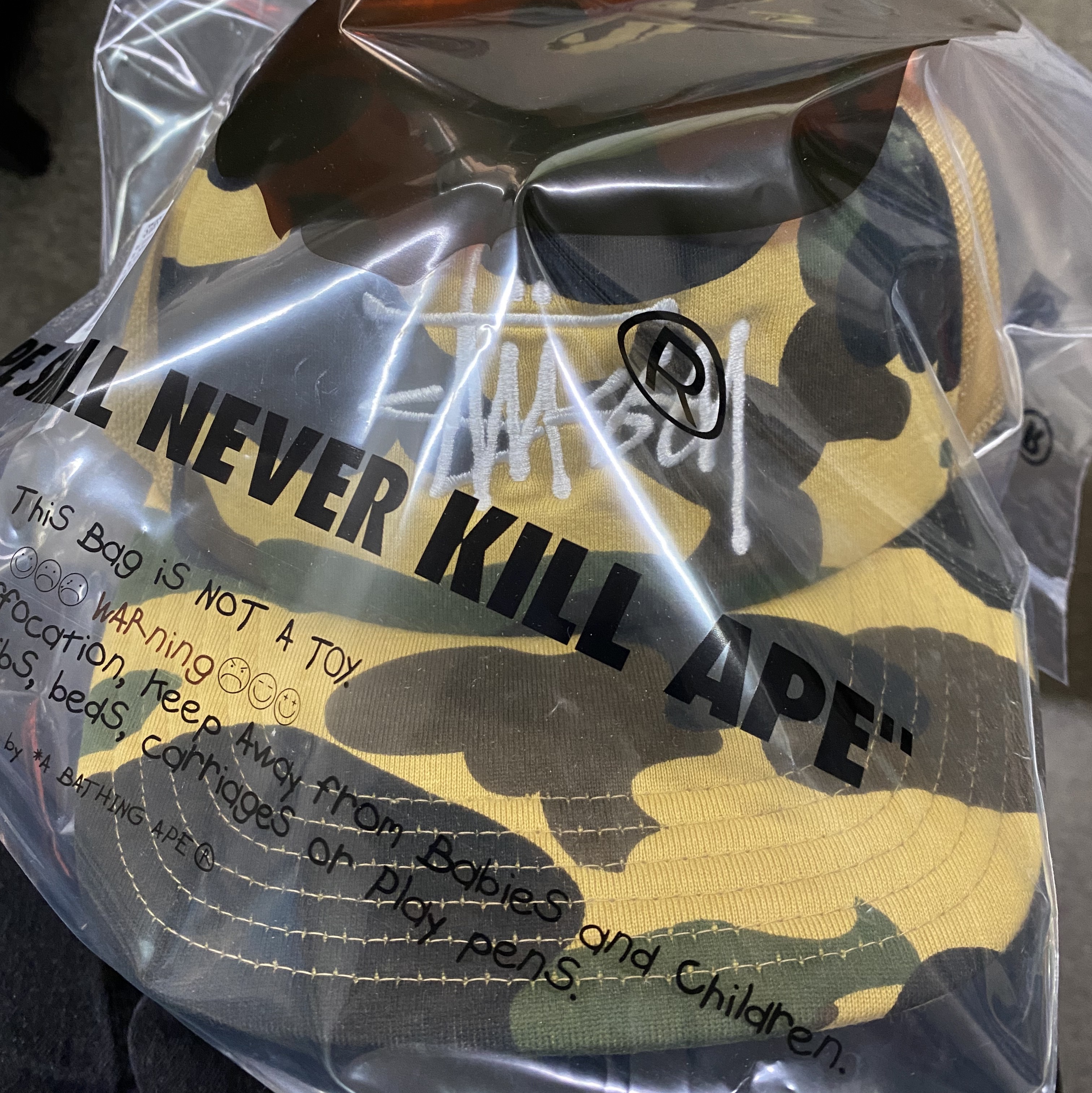 Stussy x BAPE Trucker Cap Yellow 착용 스타일