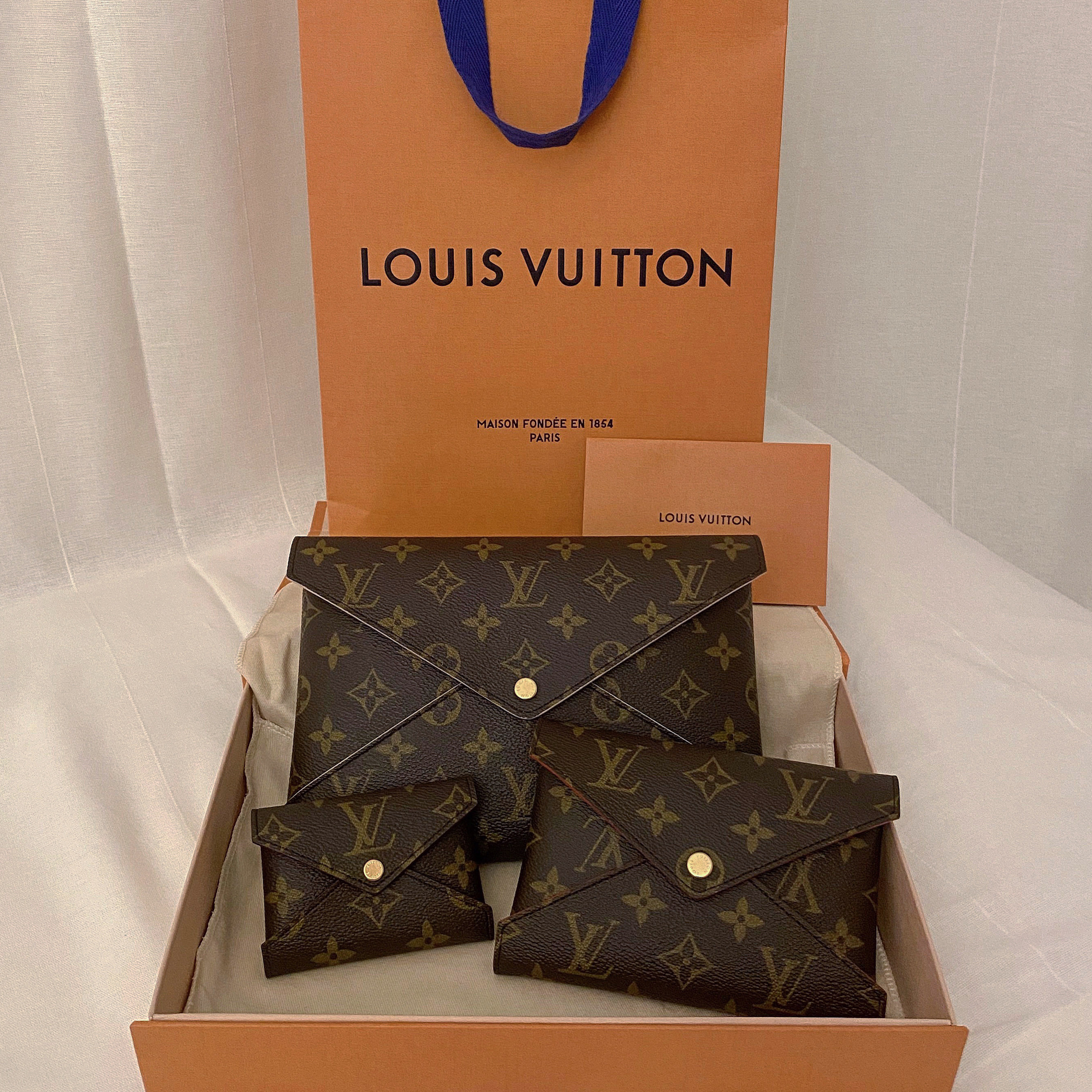 Louis Vuitton Kirigami Pochette Monogram 착용 스타일
