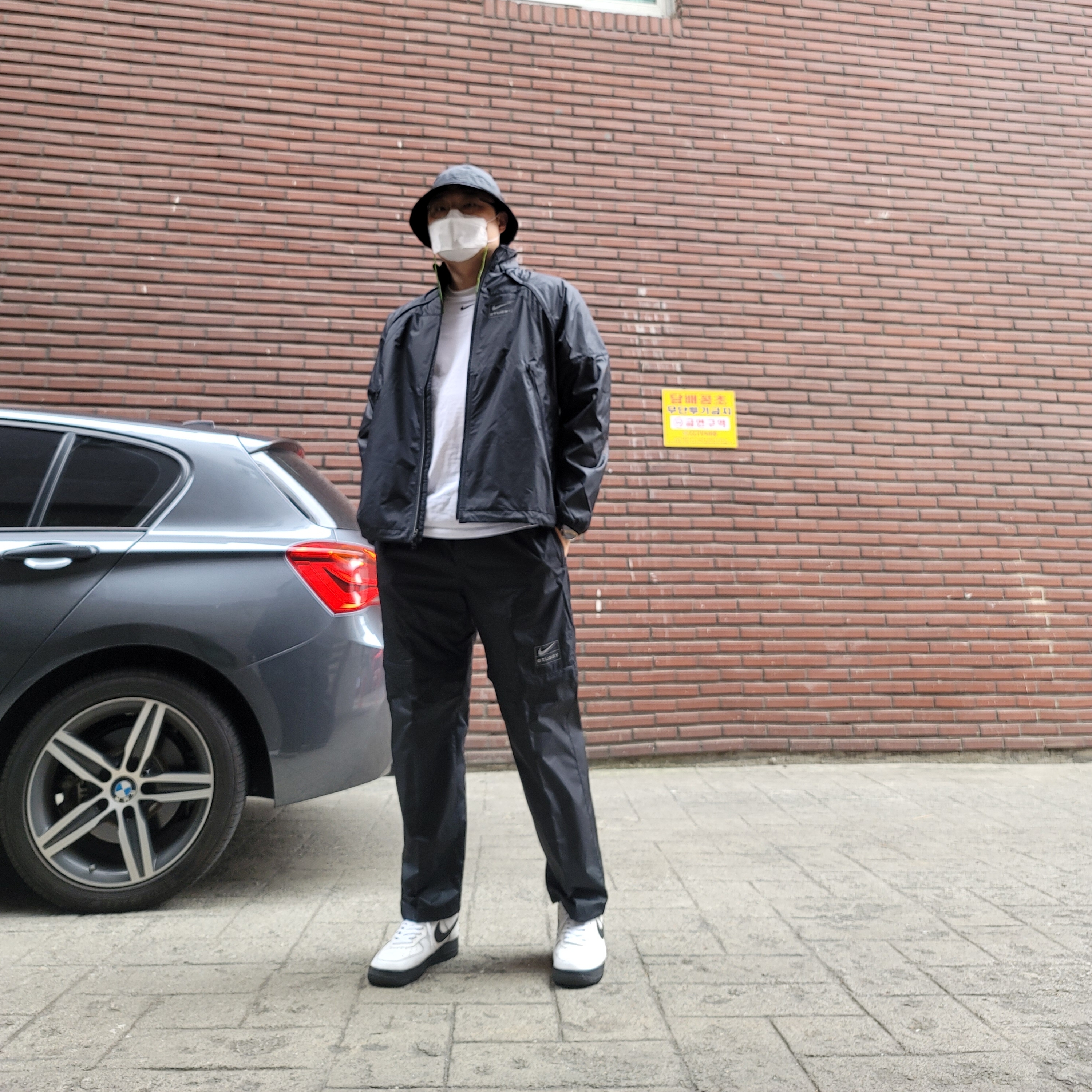Nike x Stussy NRG FL Storm-Fit Jacket Black (DO5304-010), Nike x Stussy NRG FL Storm-Fit Pants Black (DO7170-010) 착용 스타일