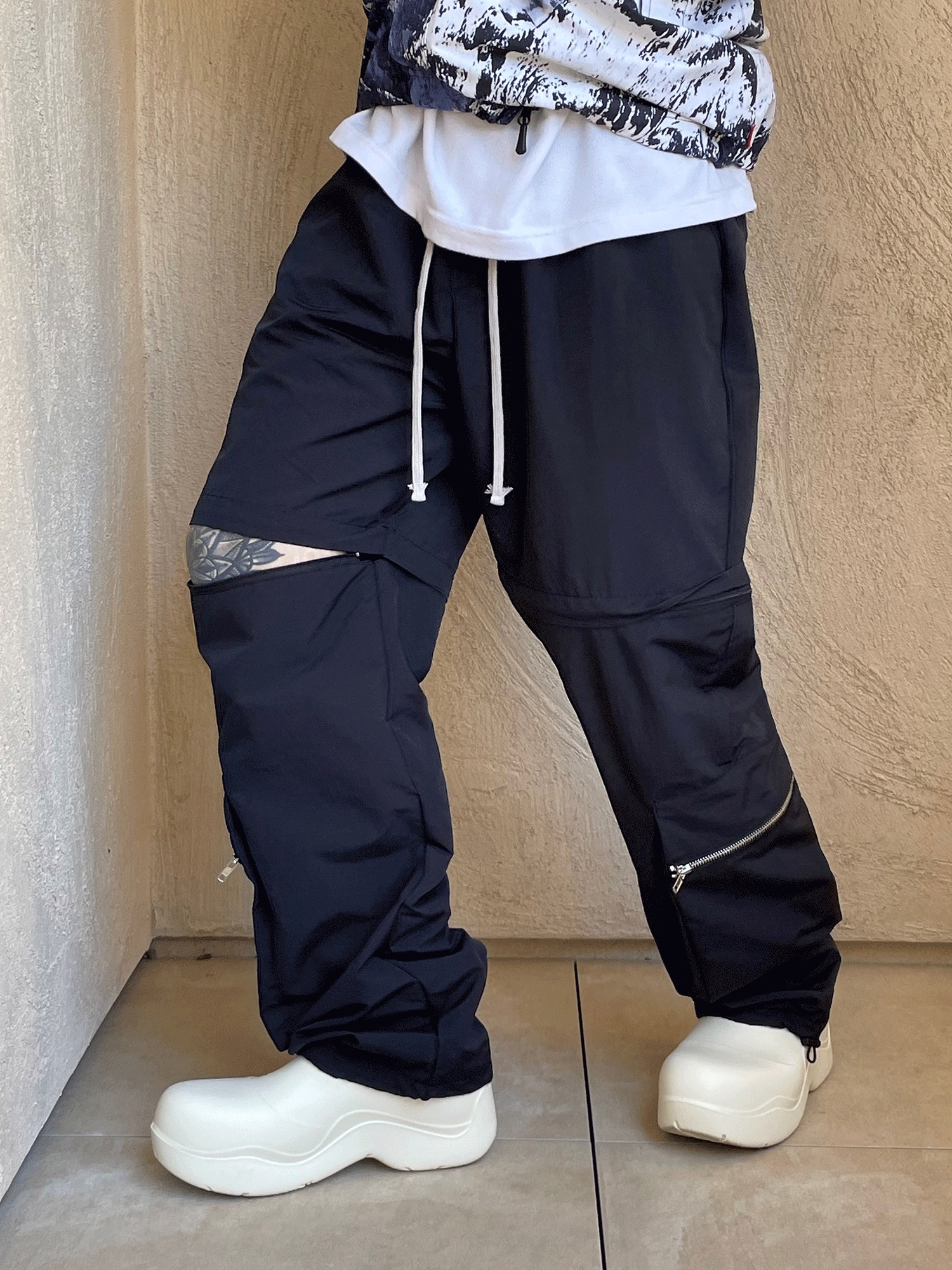 Bottega Veneta Puddle Ankle Boots Sea Salt, Nike x Stussy NRG FL Storm-Fit Pants Black (DO7170-010) 착용 스타일 - 1