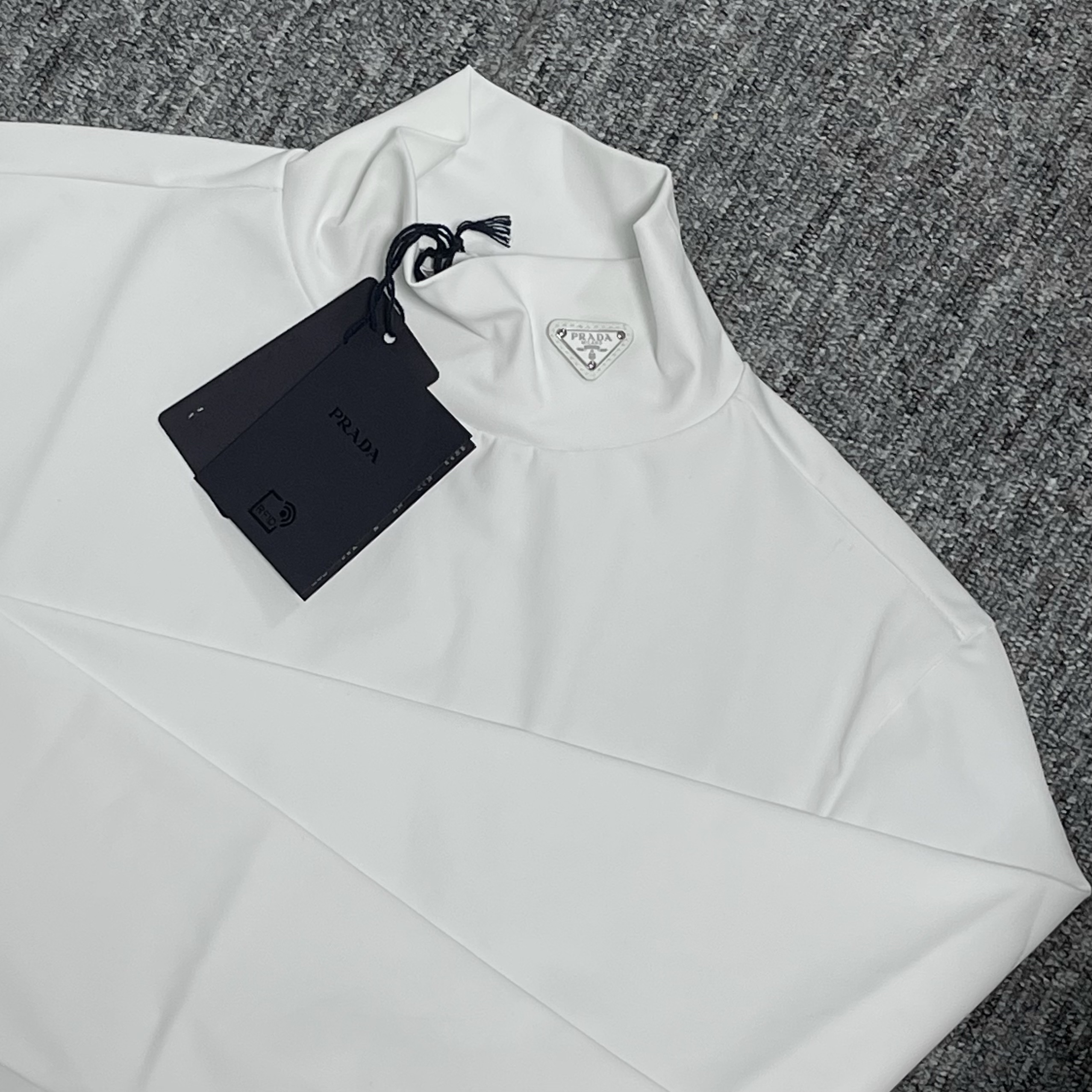 Prada Technical Jersey Mock Turtleneck White 착용 스타일