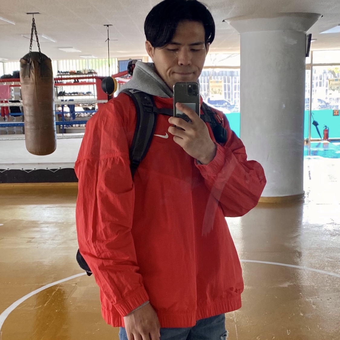 Nike x Stussy Windrunner Jacket Habanero Red 착용 스타일
