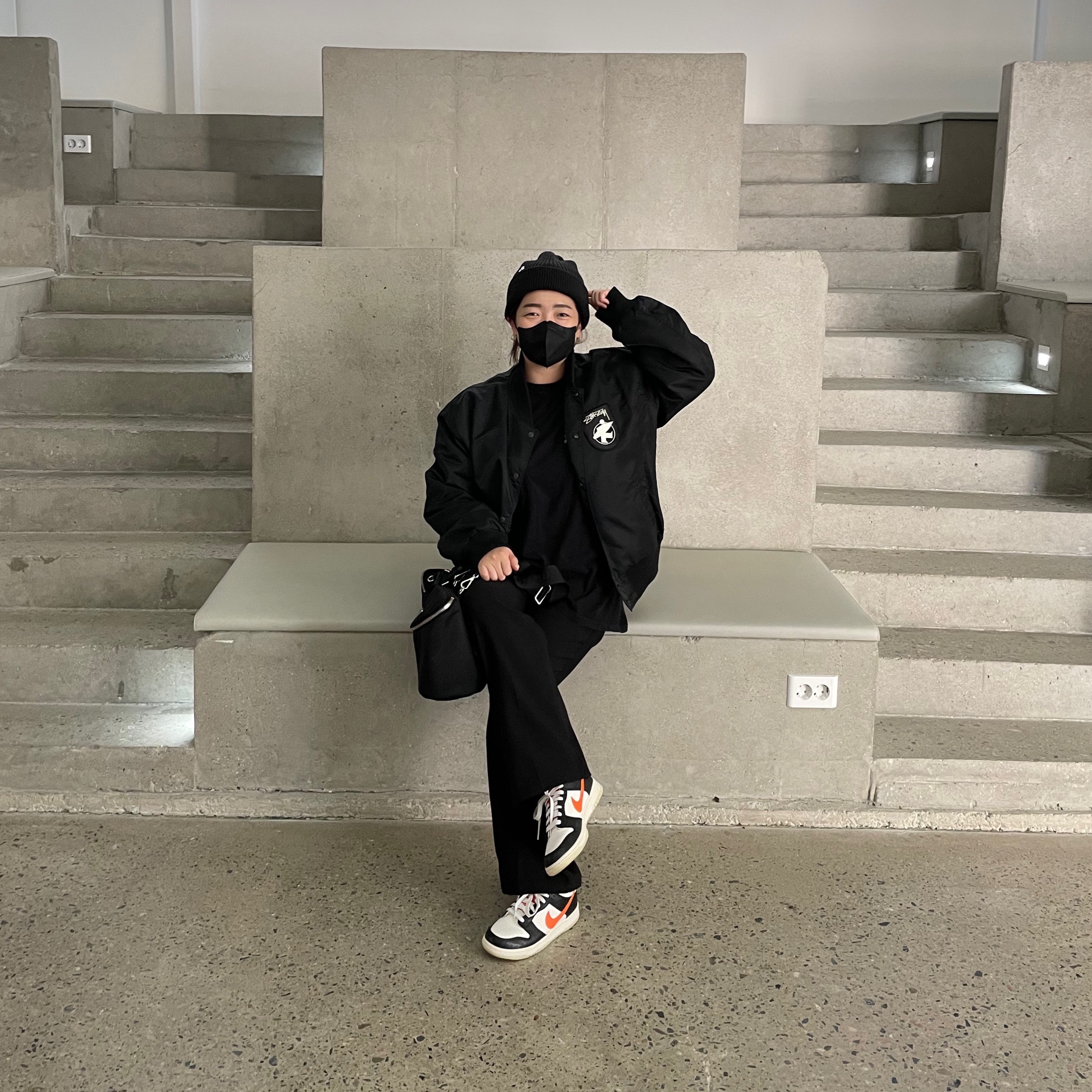 Stussy Surfman Stadium Jacket Black, Prada Re-Nylon and Leather Shoulder Bag Black 착용 스타일