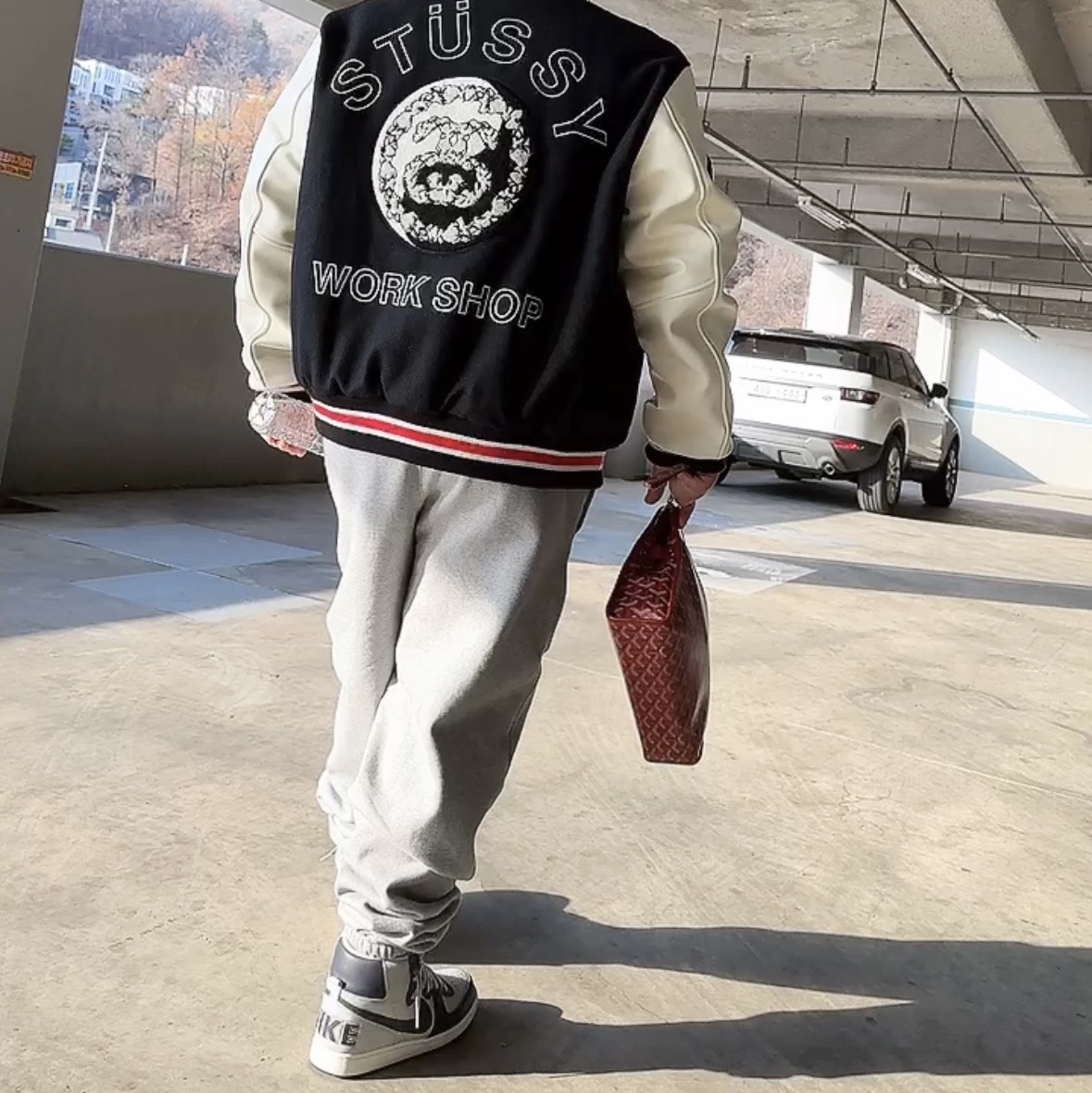 Stussy x Our Legacy x Denim Tears TTL Varsity Jacket Black, Nike x Stussy NRG RA Fleece Pants Dark Grey Heather (DJ9490-063) 착용 스타일 - 1