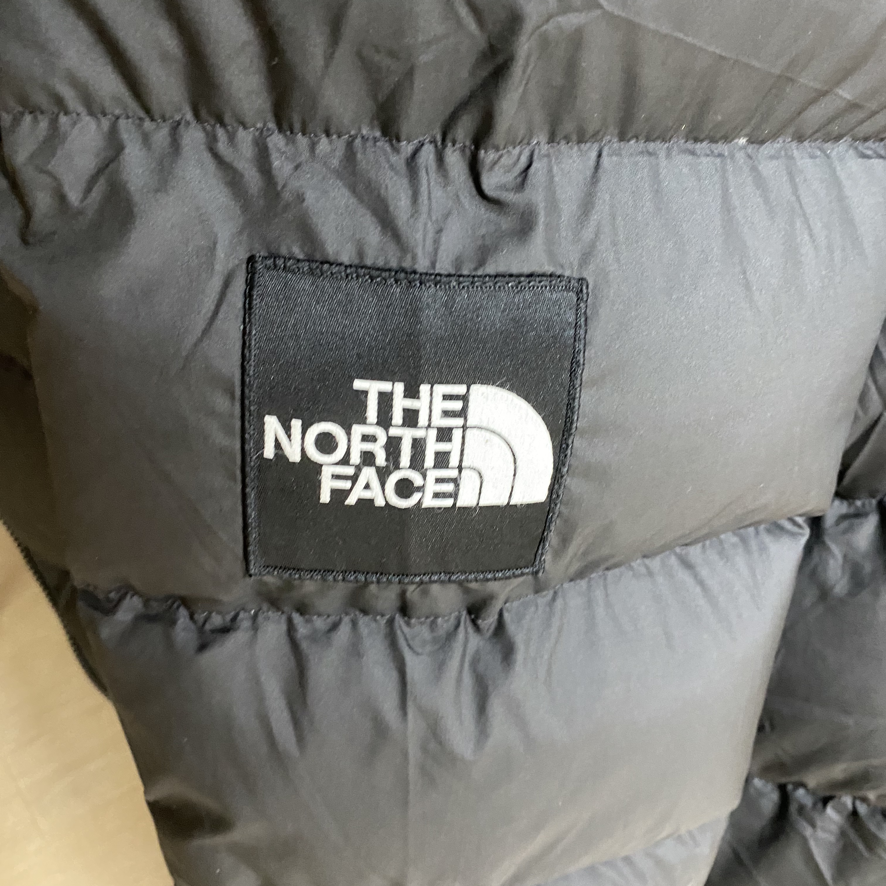 The North Face 1992 Nuptse Jacket Black 착용 스타일
