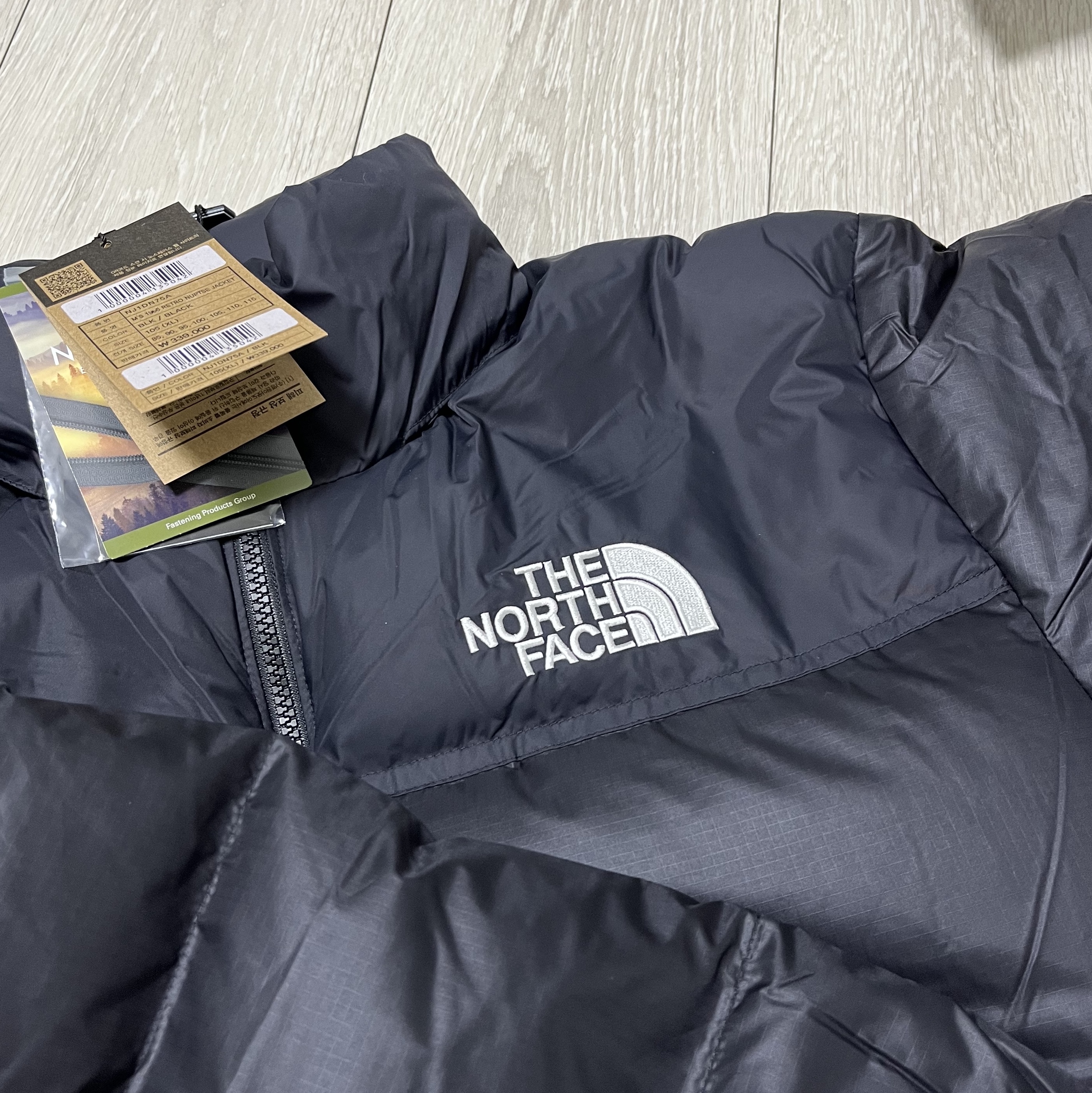 The North Face 1996 Eco Nuptse Jacket Black 착용 스타일