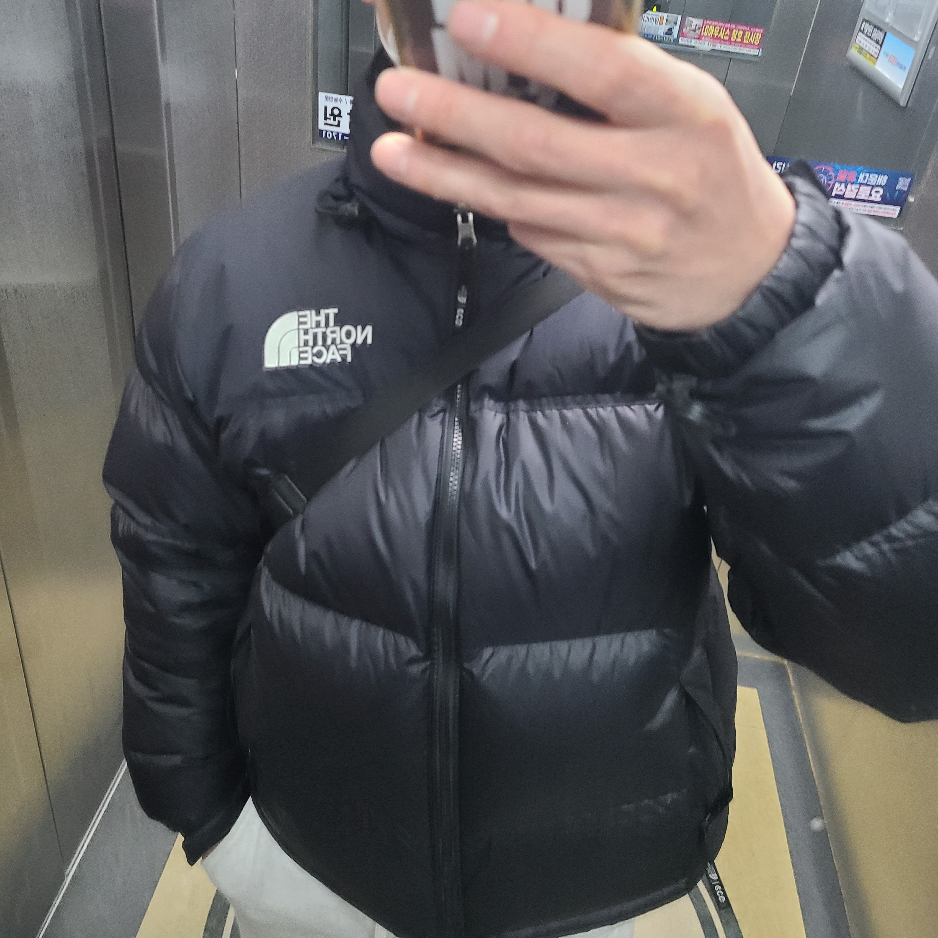 The North Face 1996 Eco Nuptse Jacket Black 착용 스타일