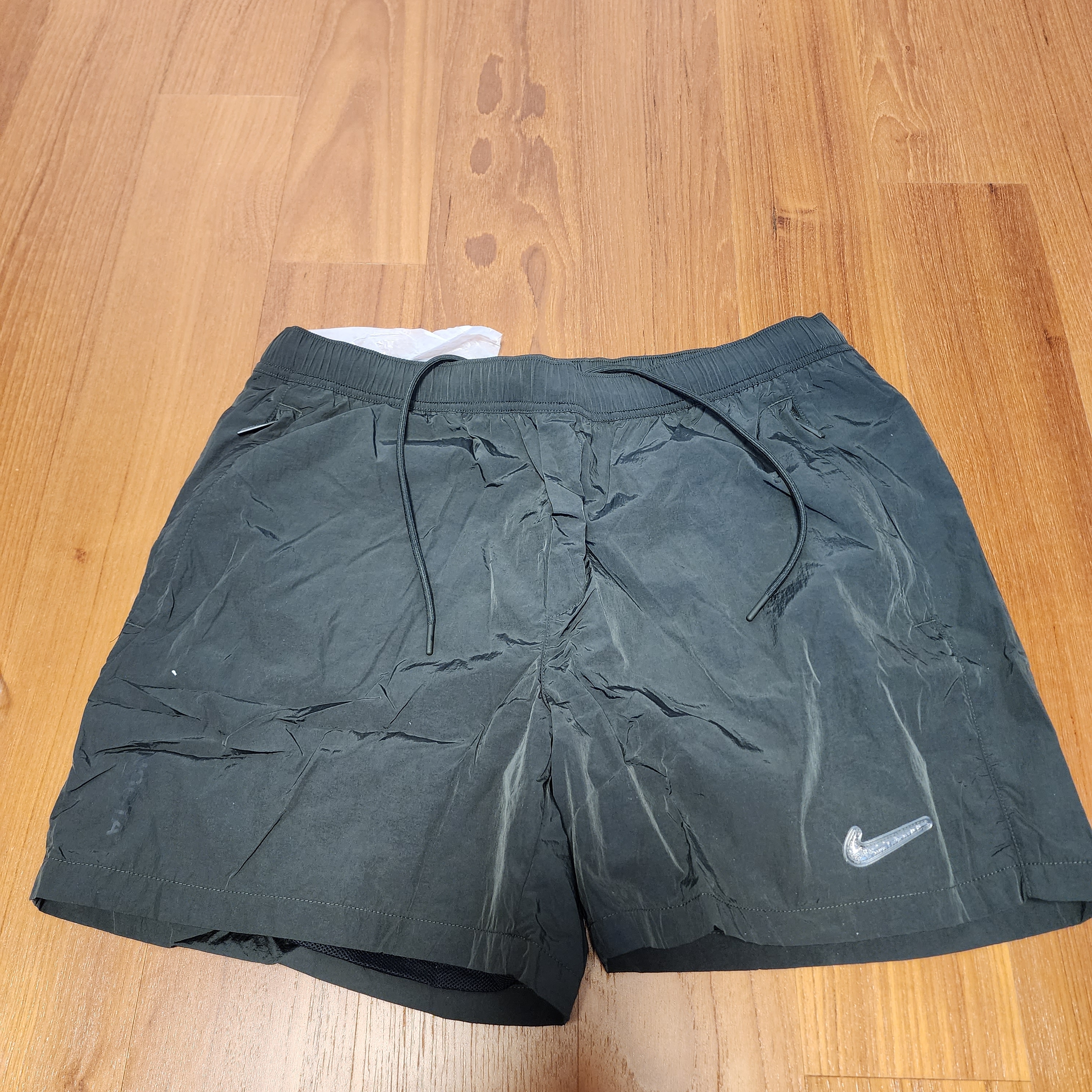 Nike x Drake Nocta Shorts Sequoia (DR2628-355) 착용 스타일 - 1