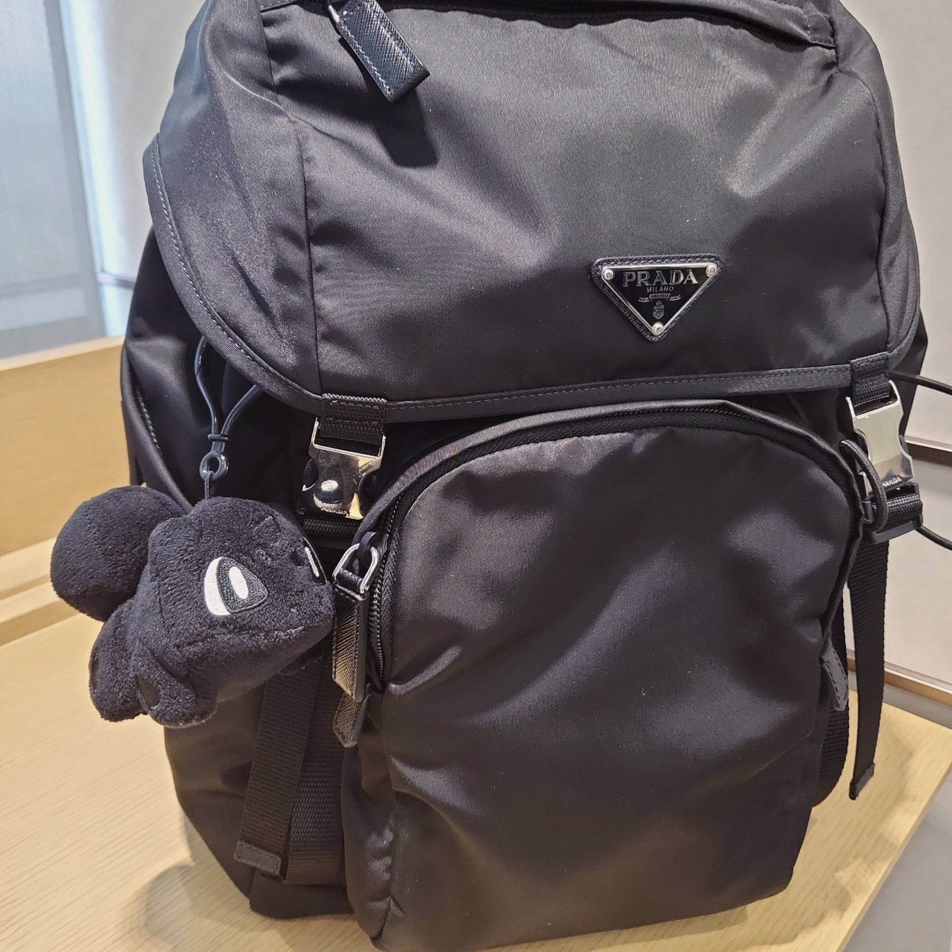 Prada Re-Nylon and Saffiano Leather Backpack Black, Fragment x Pokemon INN Thunderbolt Project TBP Mascot Key Ring Fushigidane Black 착용 스타일