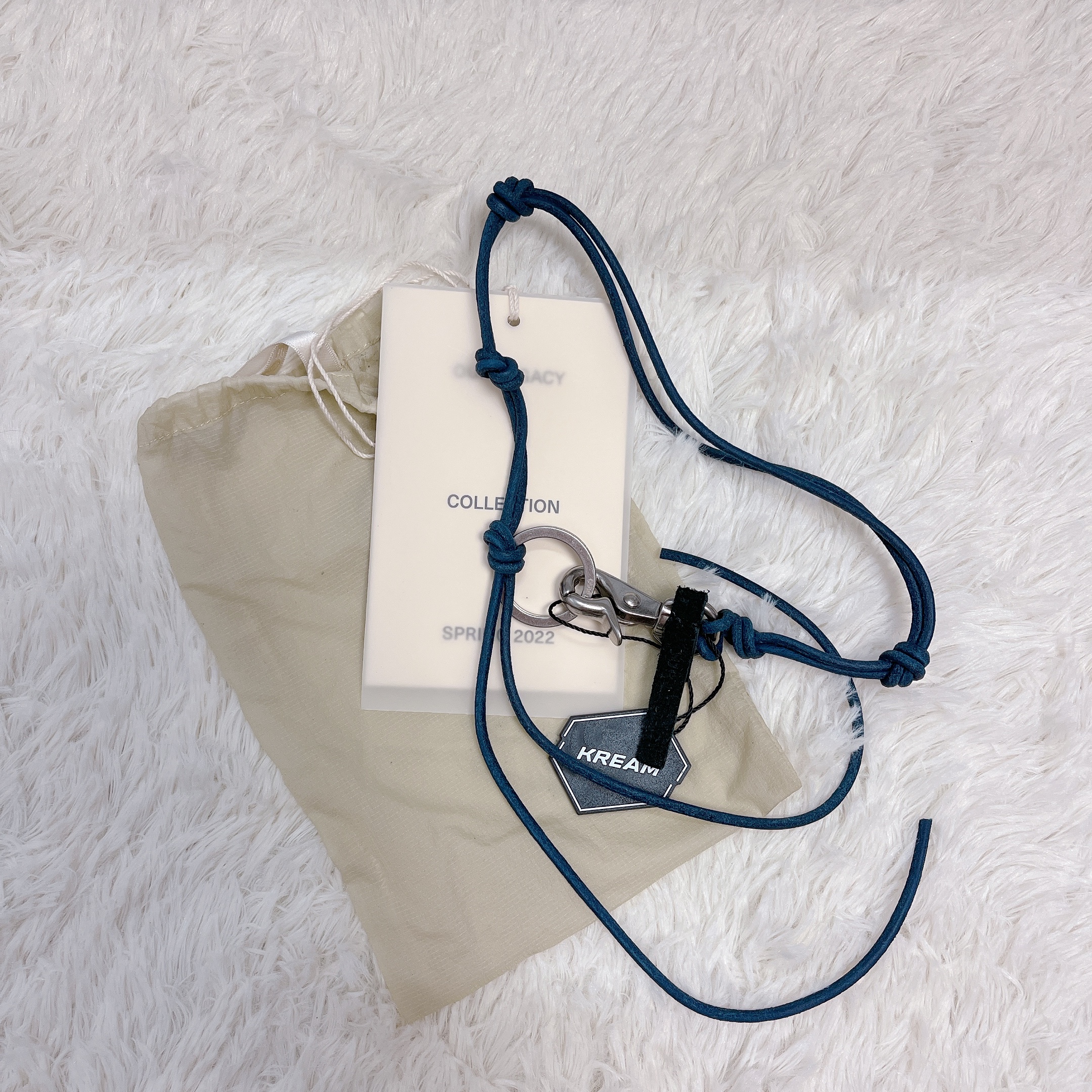 Our Legacy Ladon Leather Keychain Navy 착용 스타일