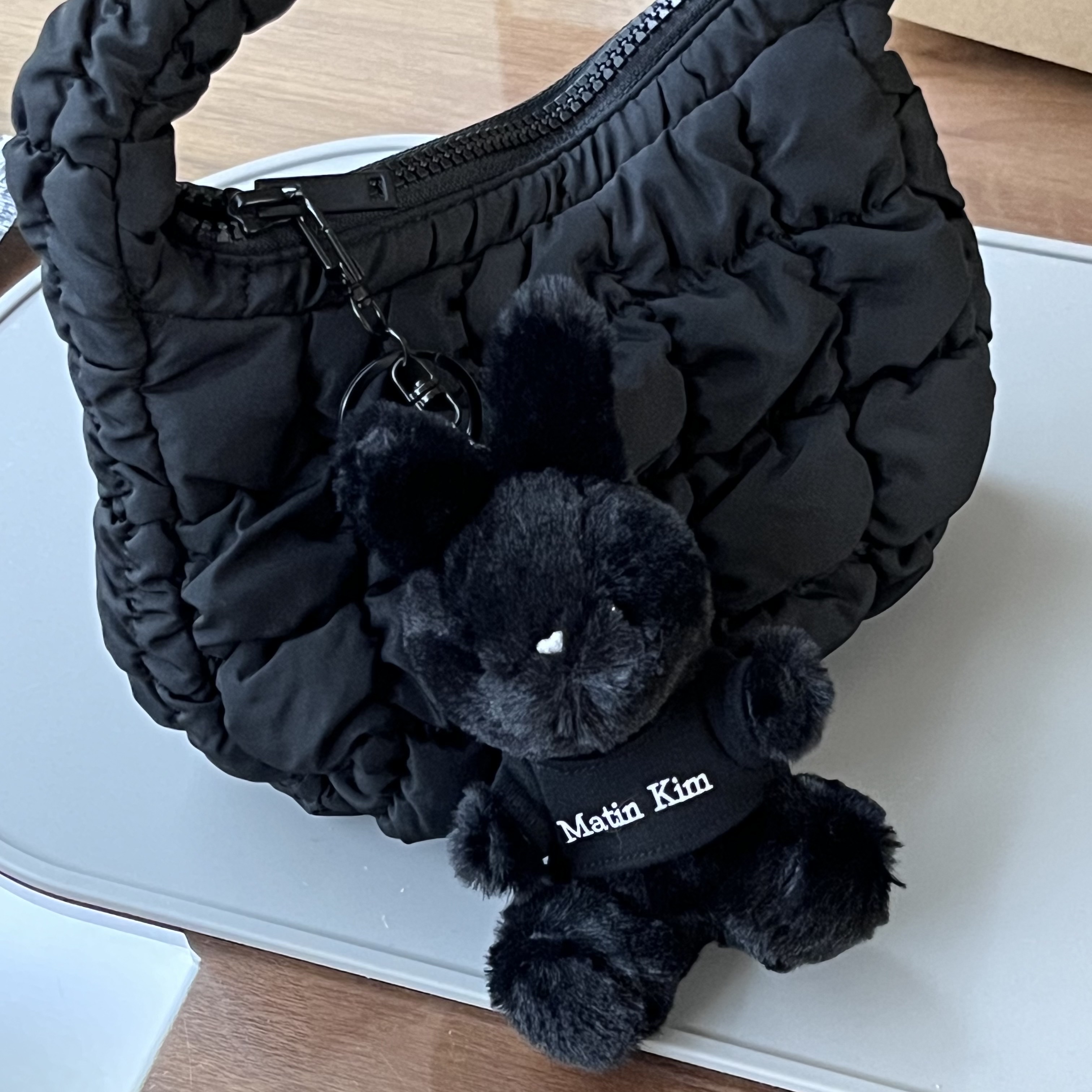 Matin Kim Black Bunny Toy Keyring Black, COS Quilted Micro Bag Black 착용 스타일