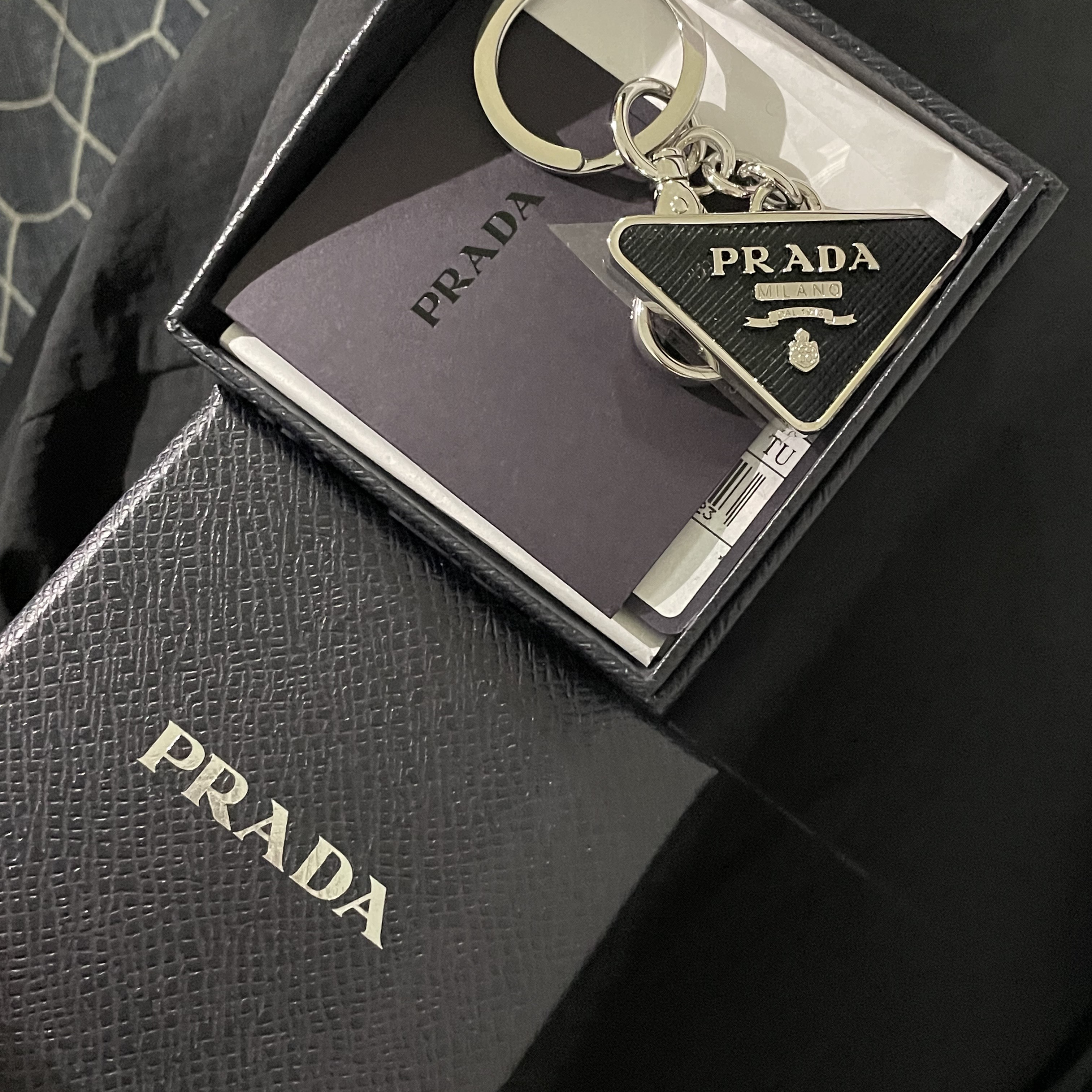 Prada Saffiano Leather Triangle Logo Keychain Black Silver 착용 스타일
