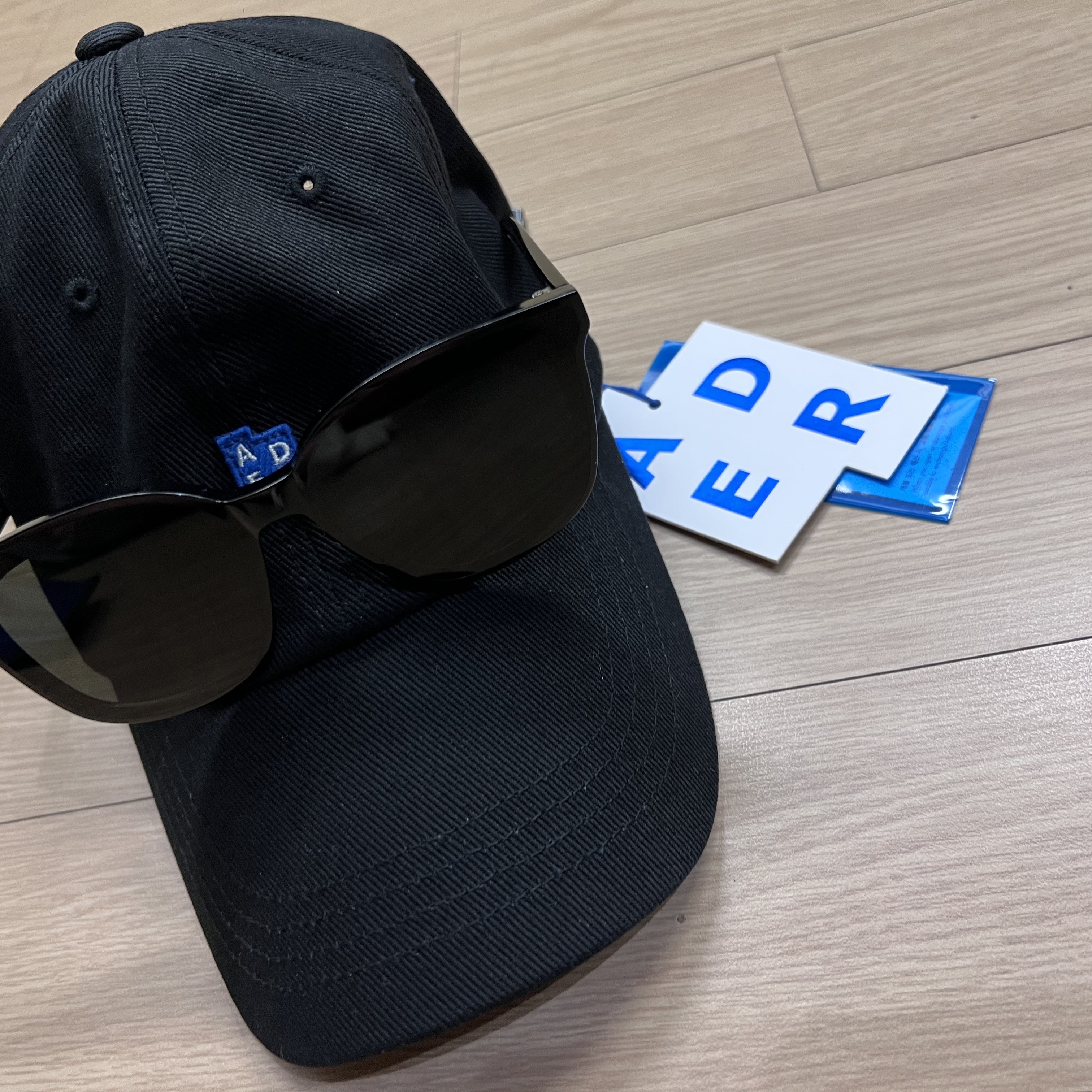 Ader Error Sig; TRS Tag Cap 01 Noir 착용 스타일