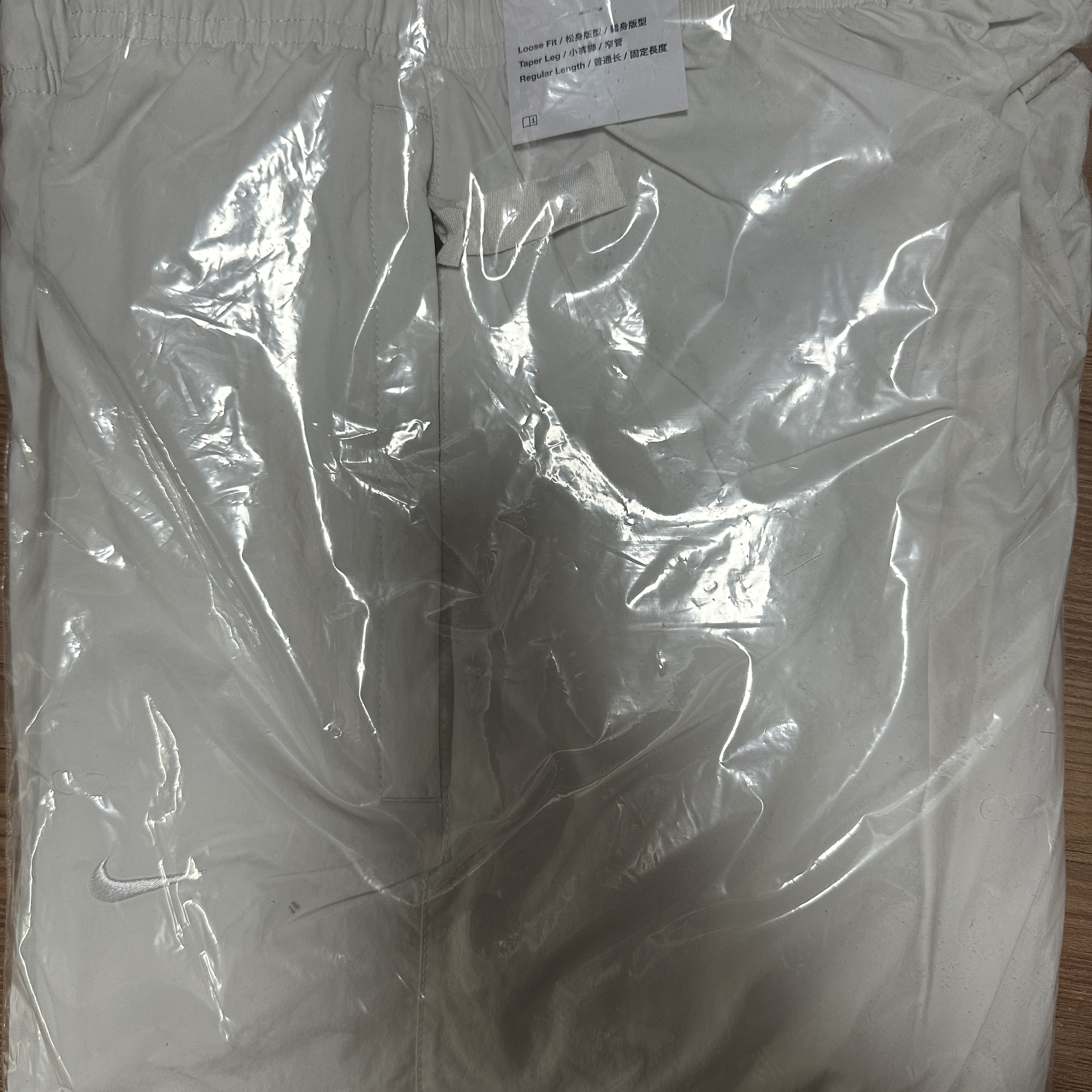 Nike NRG Solo Swoosh Woven Track Pants Phantom White - Asia 착용 스타일