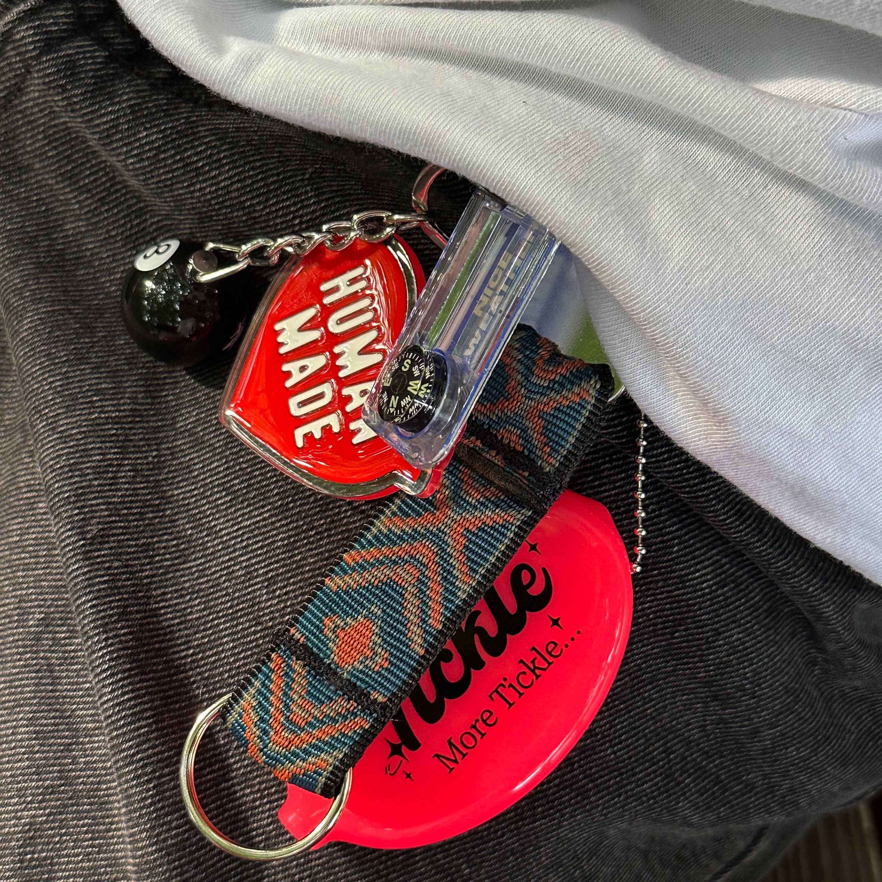Human Made Heart Keyring Red, Stussy 8 Ball Keychain Black 착용 스타일
