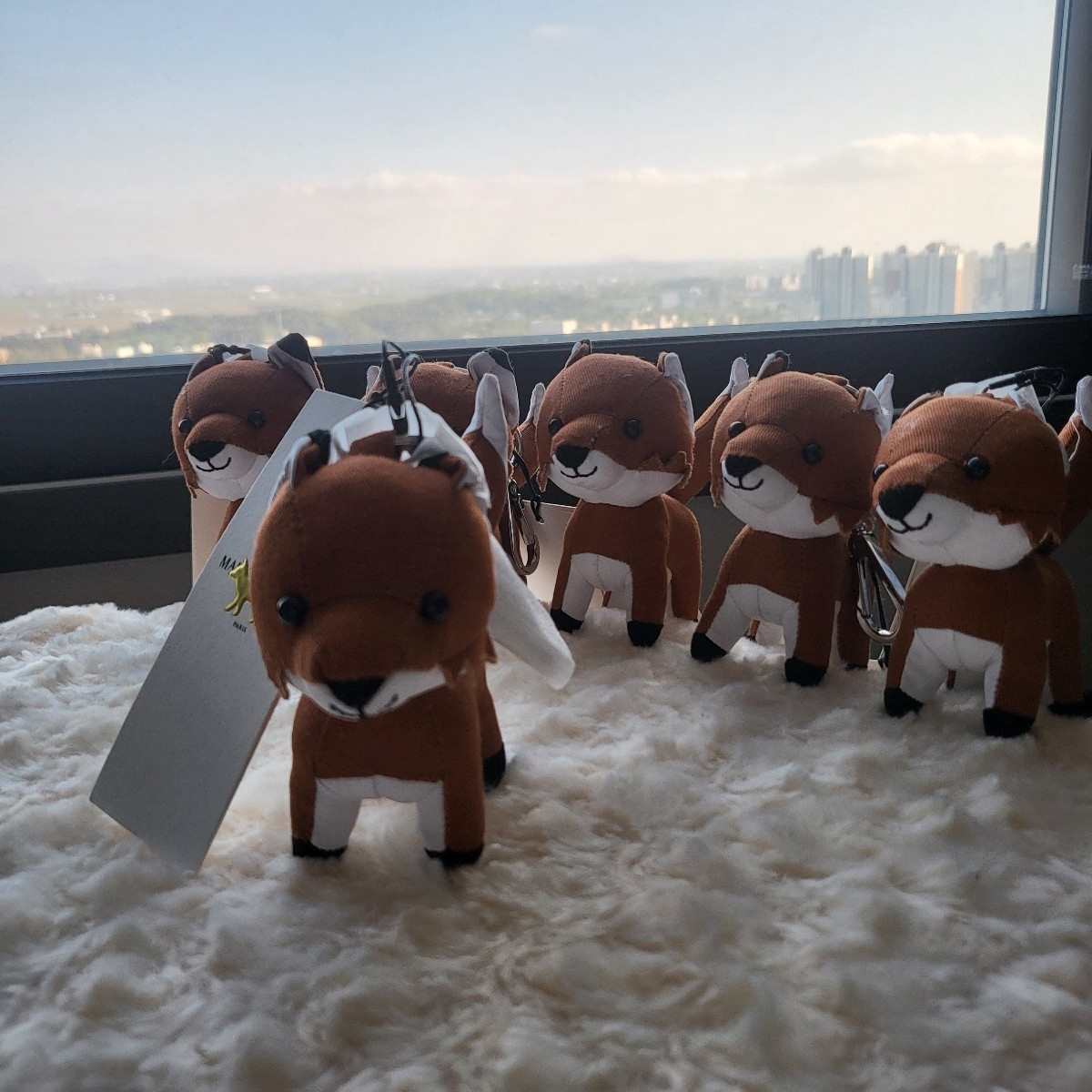 Maison Kitsune Fox Bag Charm Camel 착용 스타일