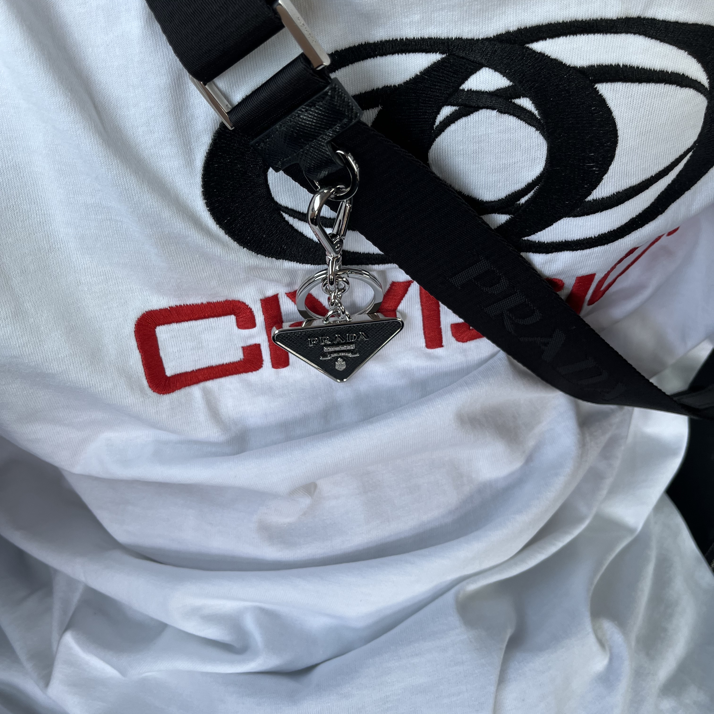 Prada Saffiano Leather Triangle Logo Keychain Black Silver 착용 스타일