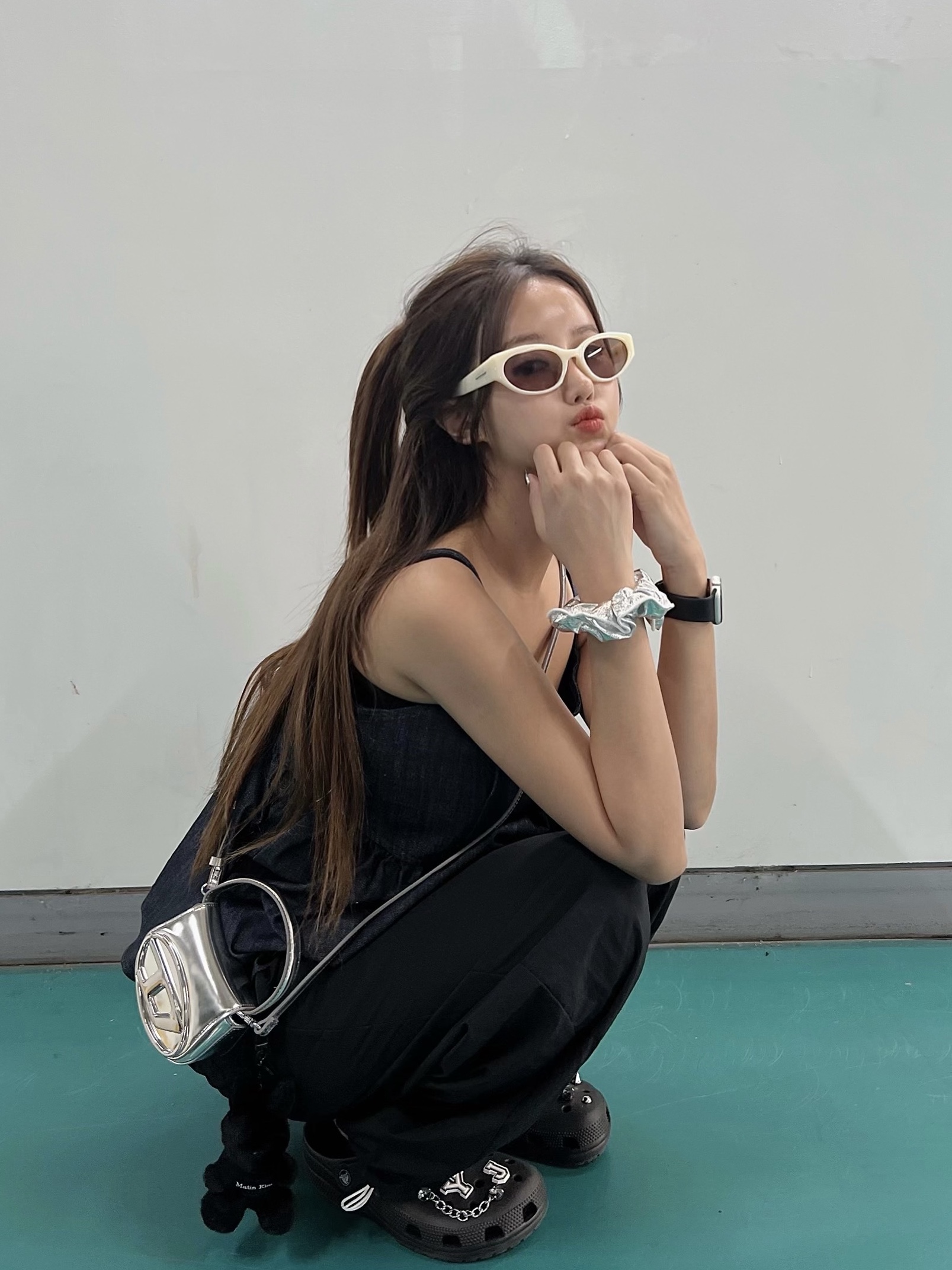 Matin Kim Black Bunny Toy Keyring Black, Diesel 1DR Mini Bag in Mirrored Leather Silver 착용 스타일