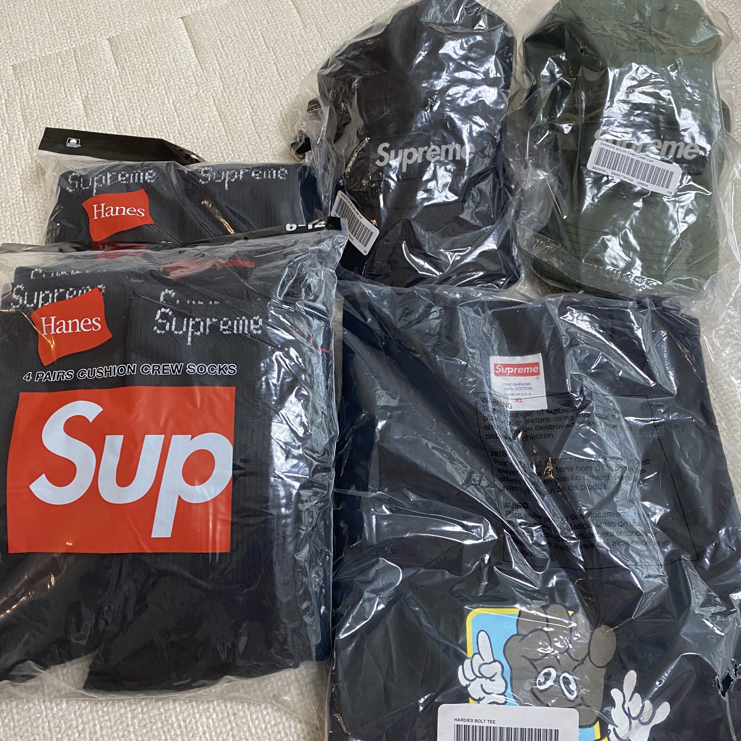 Supreme Hanes Crew Socks Black (4 Pack), Supreme Overdyed Camo Nylon Camp Cap Black - 23SS 착용 스타일
