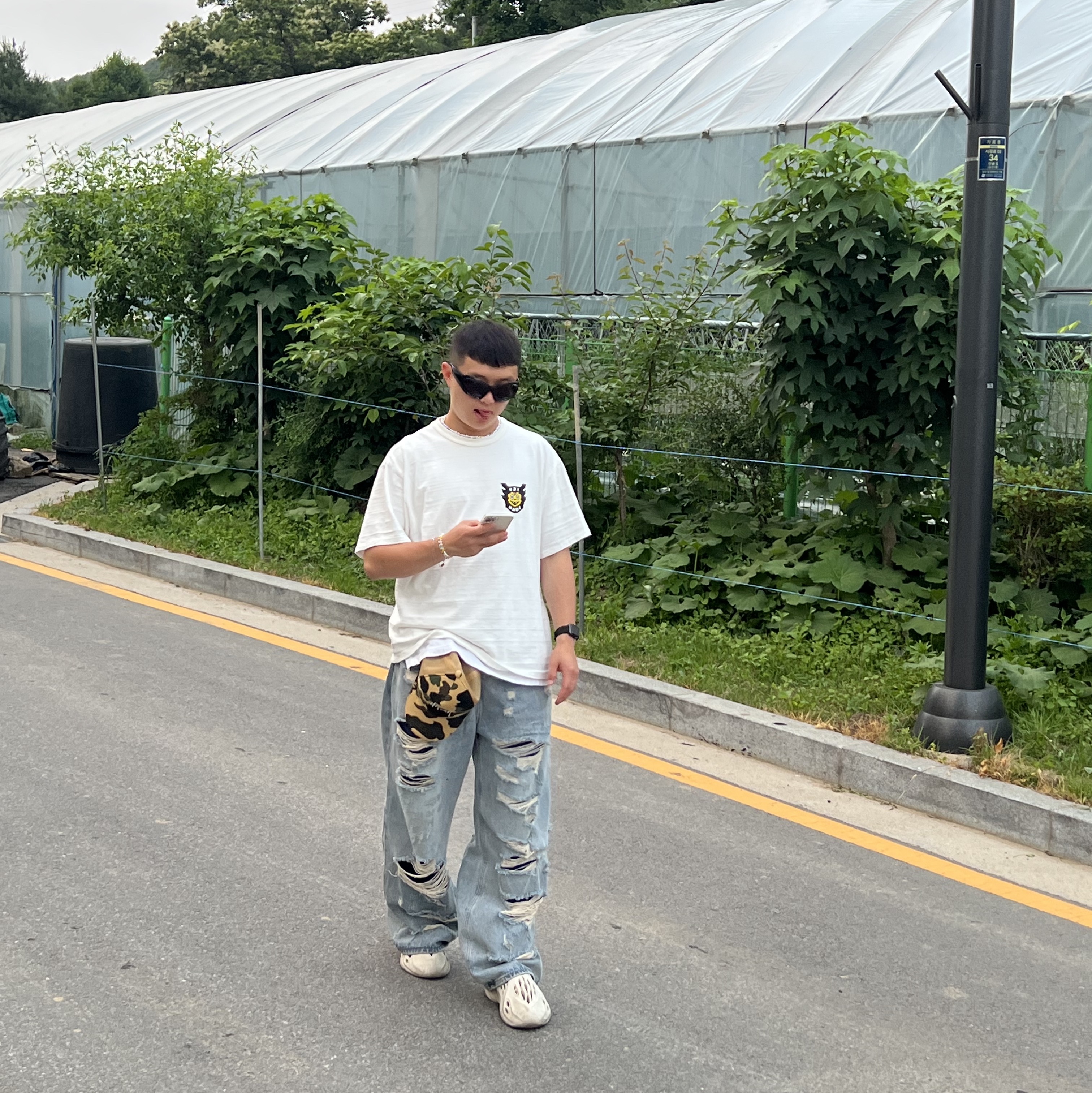 Human Made Uzi Made T-Shirt #1 White, Stussy x BAPE Trucker Cap Yellow 착용 스타일