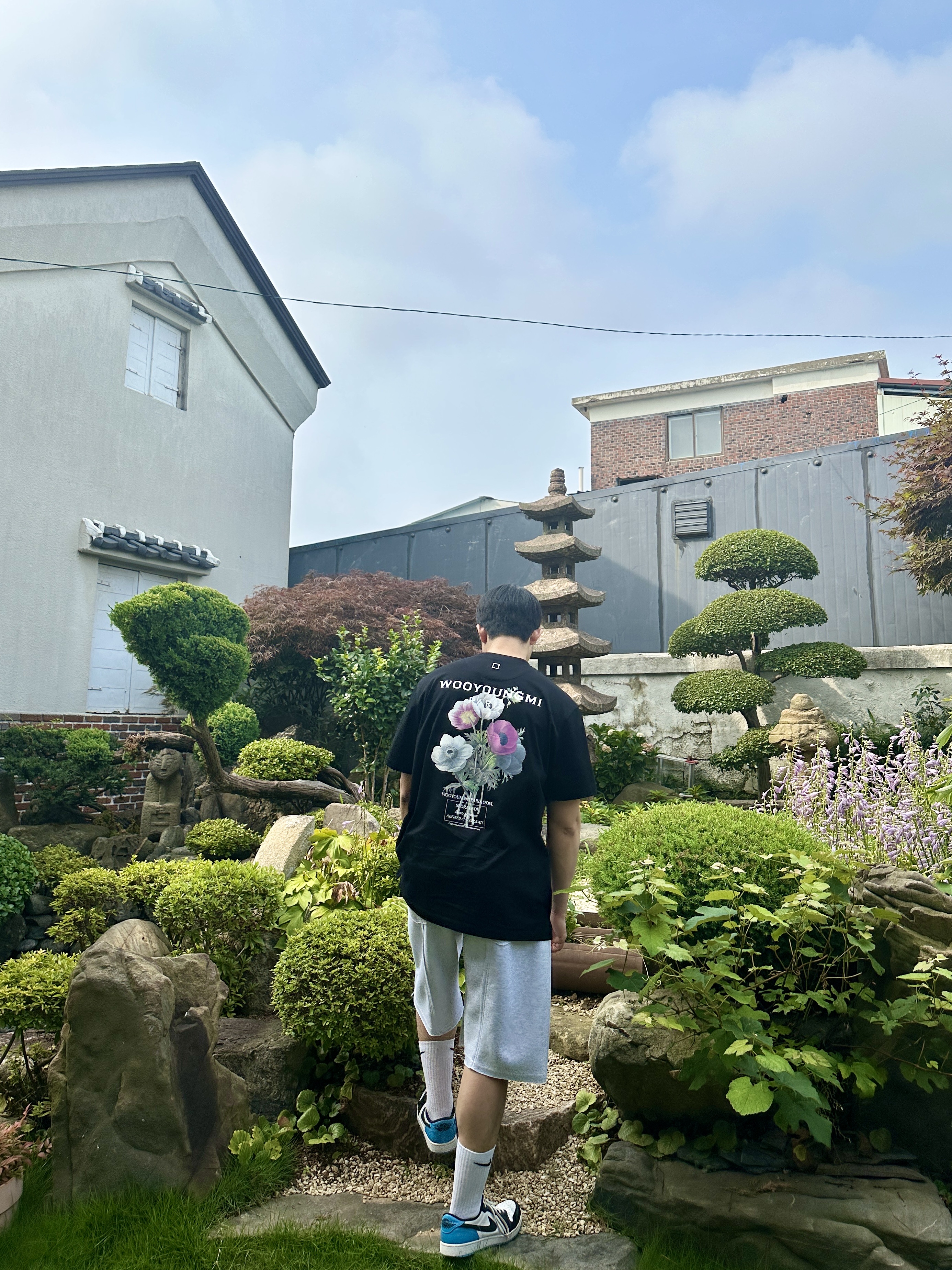 Wooyoungmi Flower Print Back Logo T-Shirt Black - 23FW, Jordan 1 Retro Low OG Black and Dark Powder Blue 착용 스타일