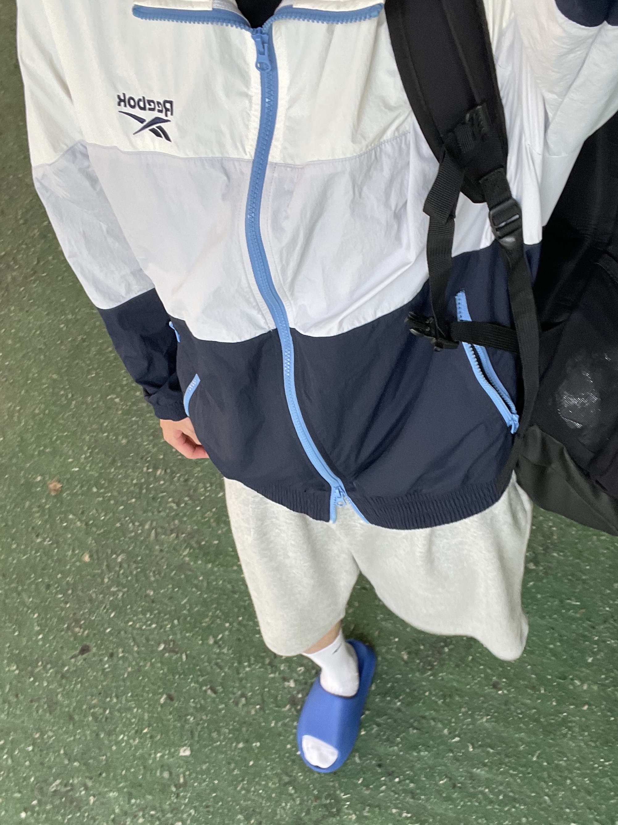 Reebok The Roundup: No Way Out Windbreaker White, Adidas Yeezy Slide Azure 착용 스타일
