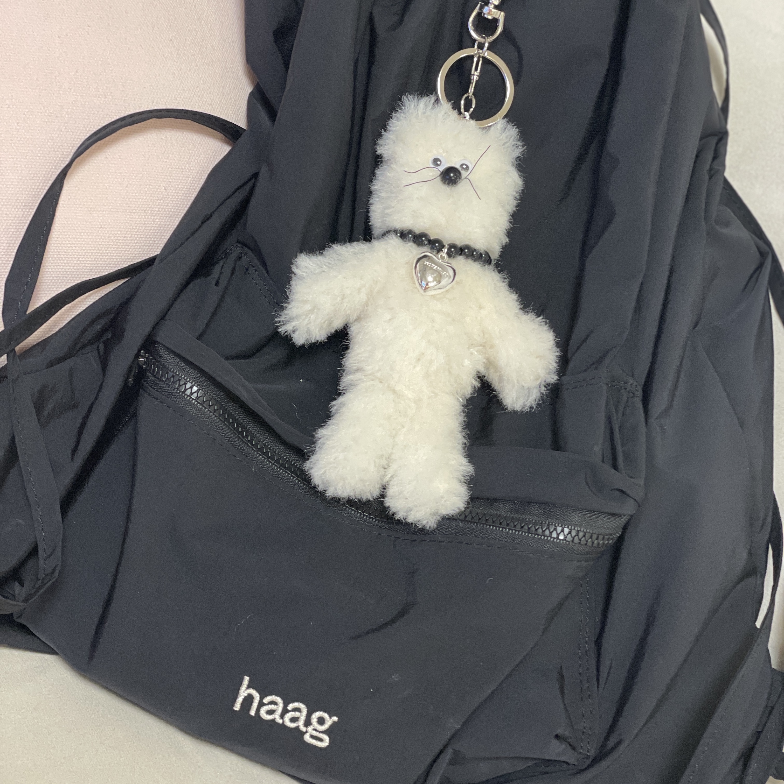 Haag String Backpack Black 착용 스타일