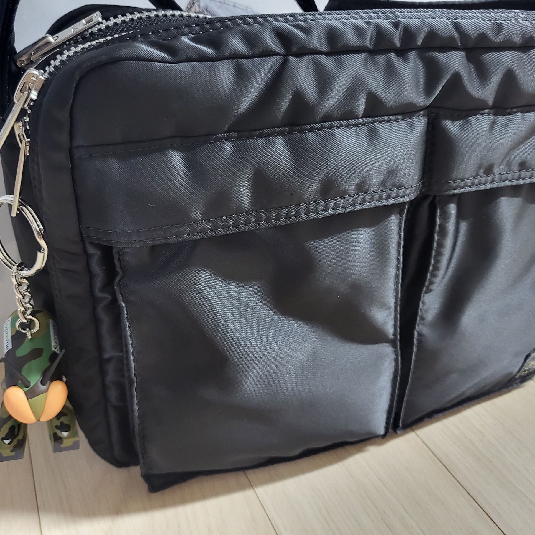 Supreme x Comme des Garcons Junya Watanabe Man Bug Keychain Woodland Camo - 21FW 착용 스타일