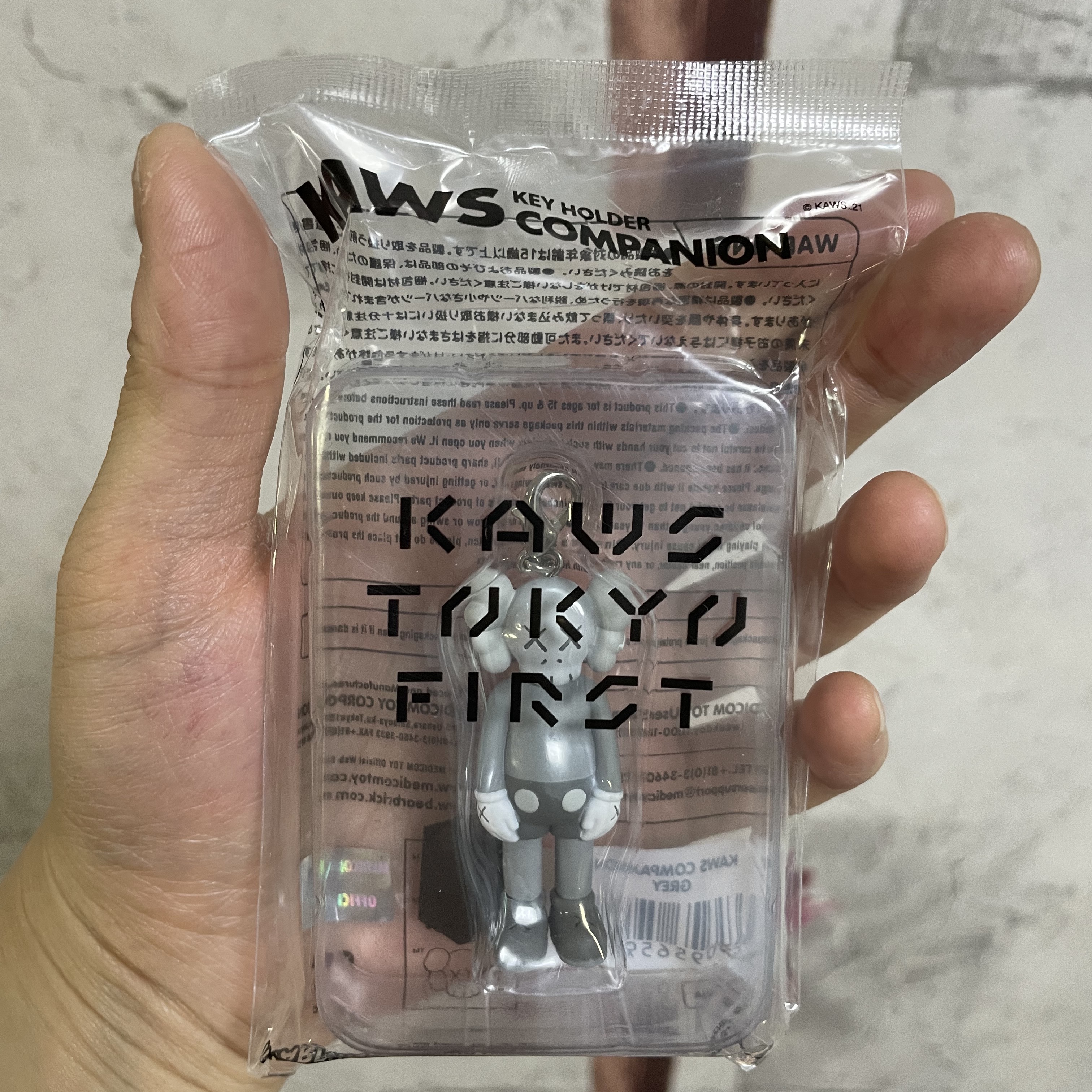 Kaws Tokyo First Companion Keychain Grey 착용 스타일