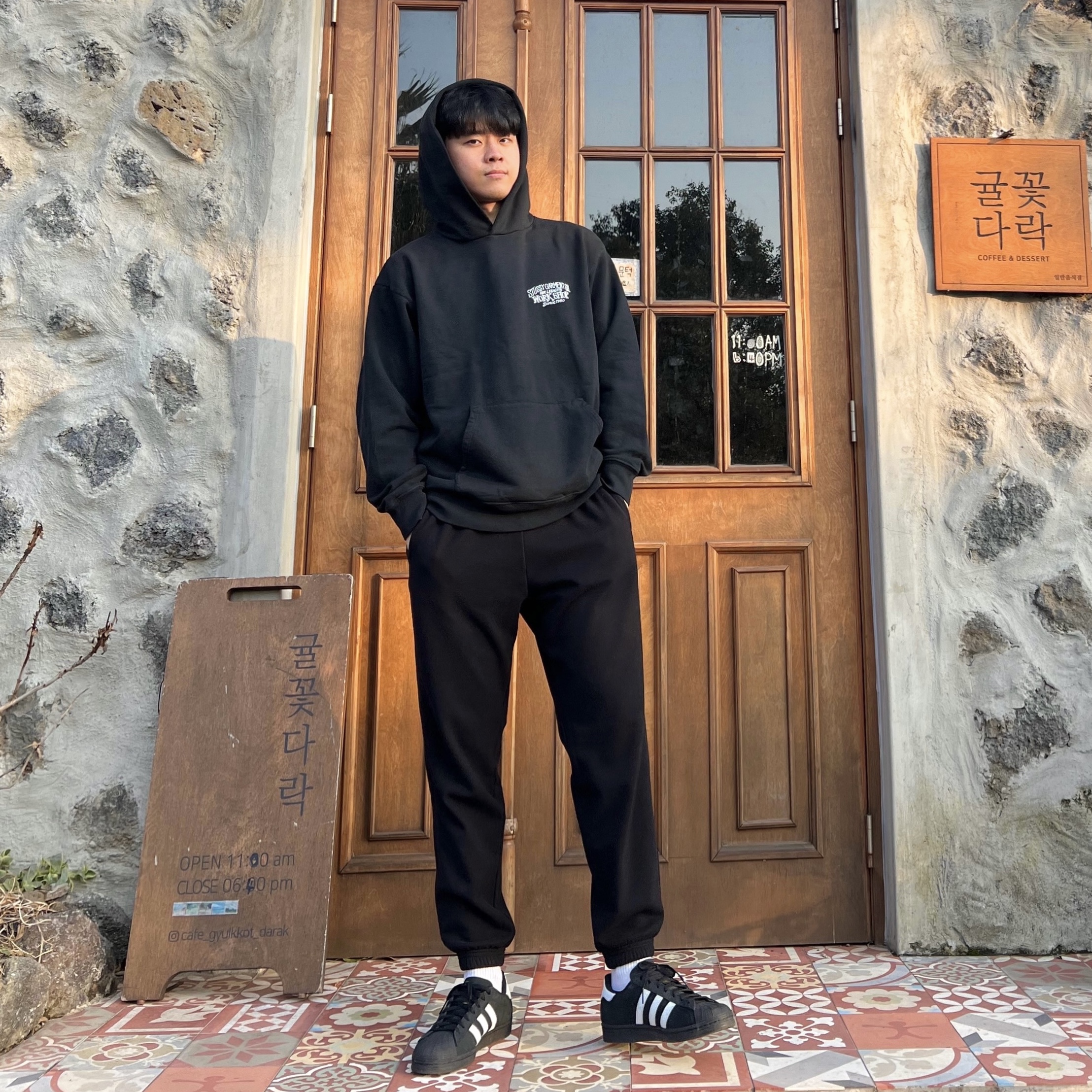 Stussy x Our Legacy Work Shop Surfman Pigment Dyed Hoodie Black, Adidas Superstar Core Black White 착용 스타일
