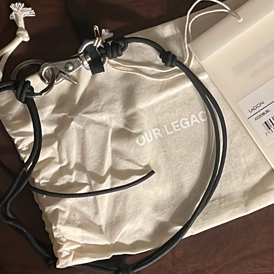 Our Legacy Ladon Leather Keychain Black 착용 스타일