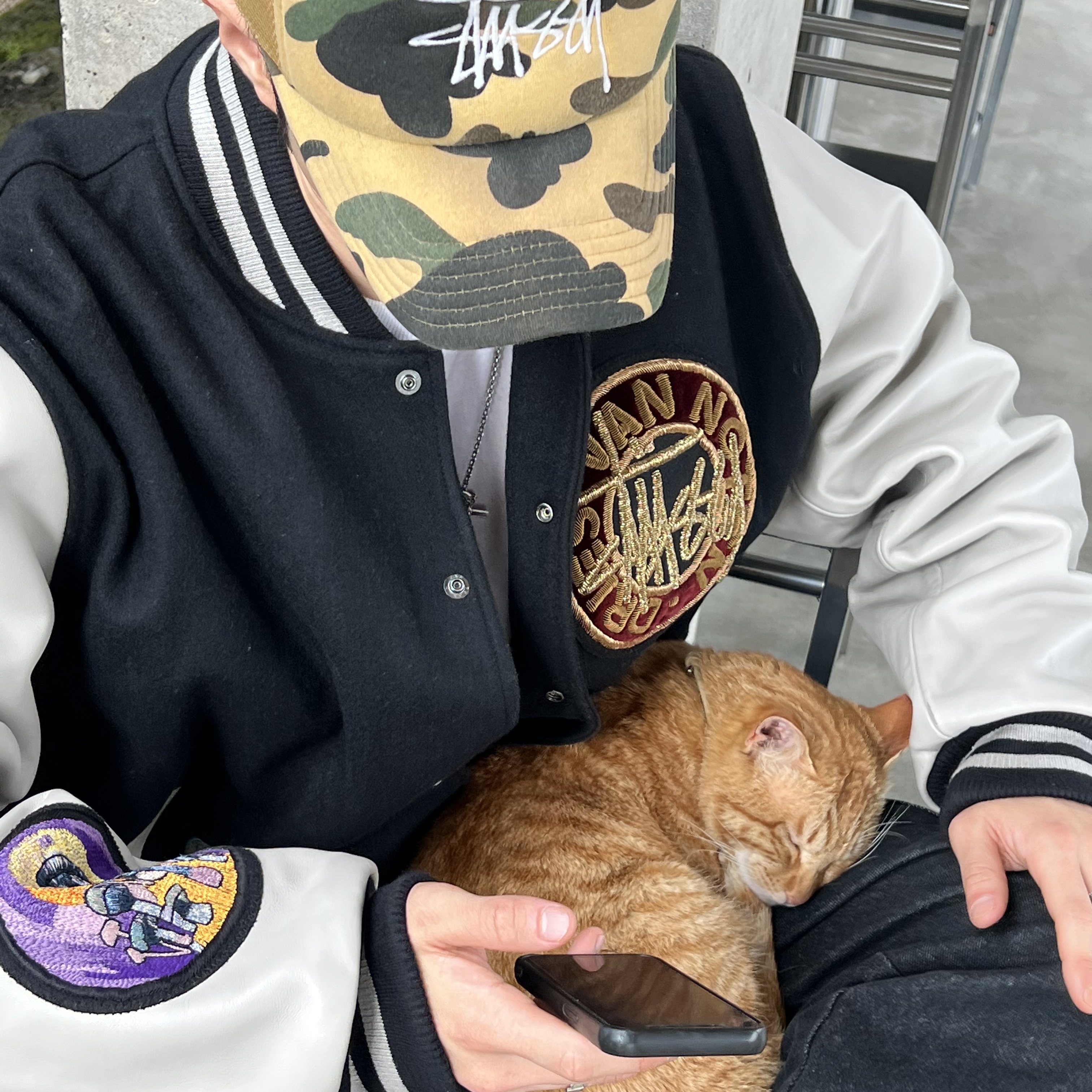 Stussy x Dries Van Noten Varsity Jacket Black, Stussy x BAPE Trucker Cap Yellow 착용 스타일